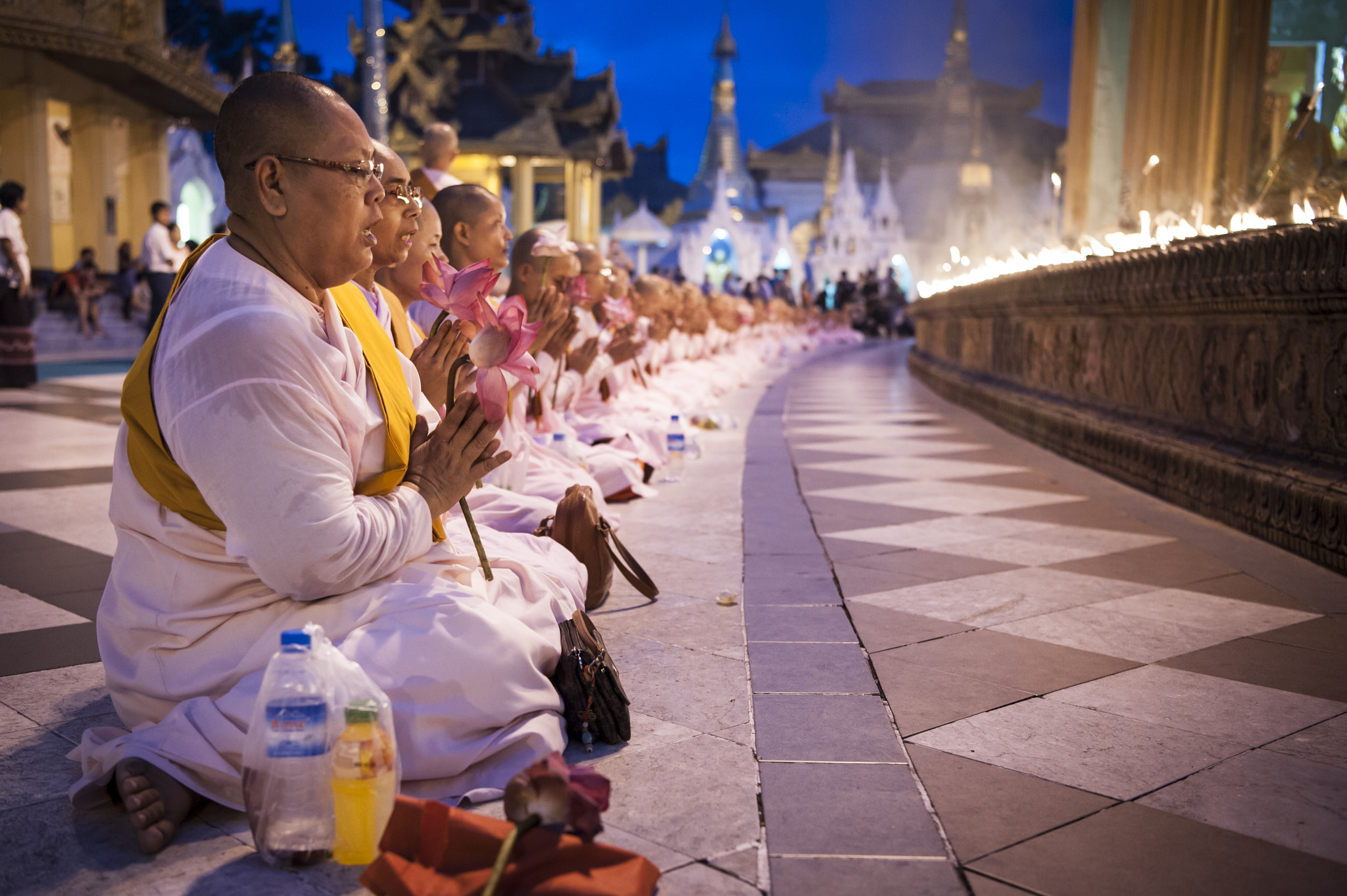 Nikon D700 + Nikon AF-S Nikkor 24-70mm F2.8E ED VR sample photo. Burmese nuns praying at shwedagon pagoda photography