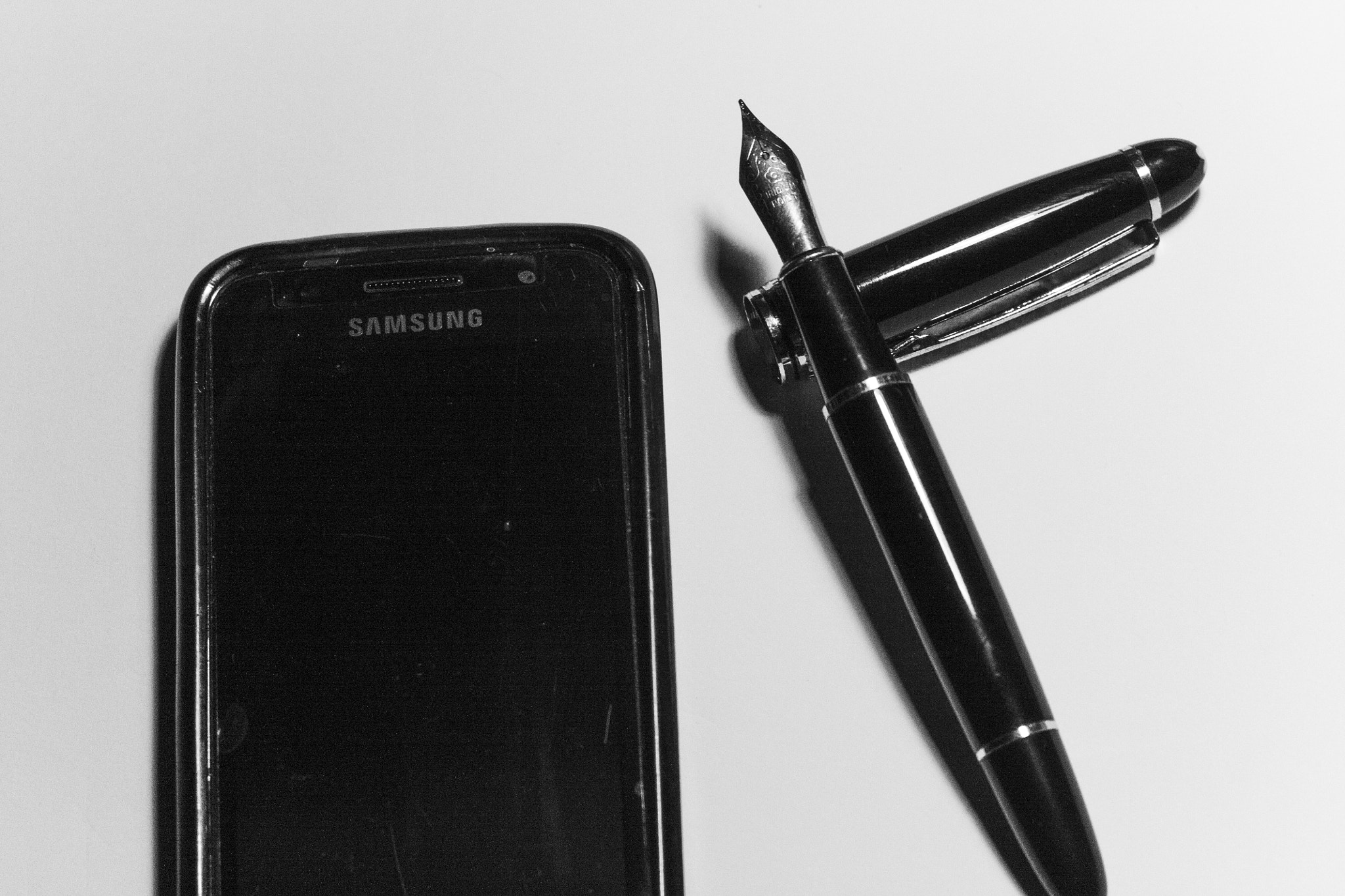 Canon EF 35-80mm f/4-5.6 sample photo. Phone vs pen photography