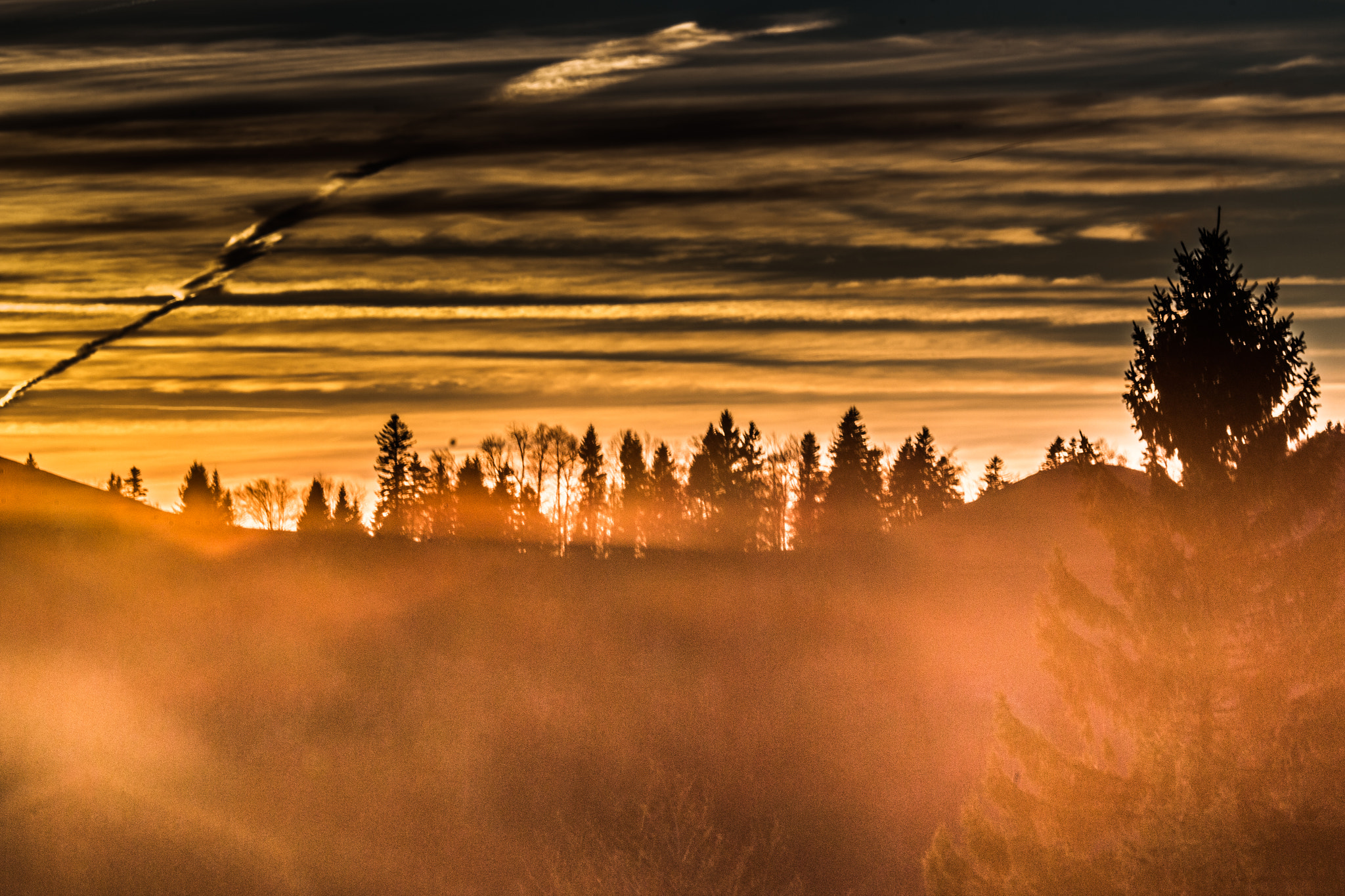 Canon EOS 70D + Canon EF 135mm F2L USM sample photo. Sunset haze photography