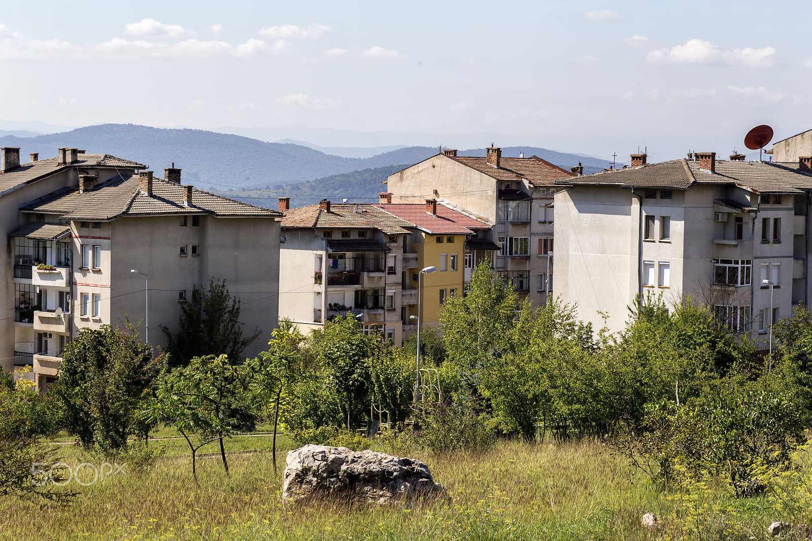 Canon EF 100mm F2.8 Macro USM sample photo. Daytime skyline of houses and buildings in veliko photography