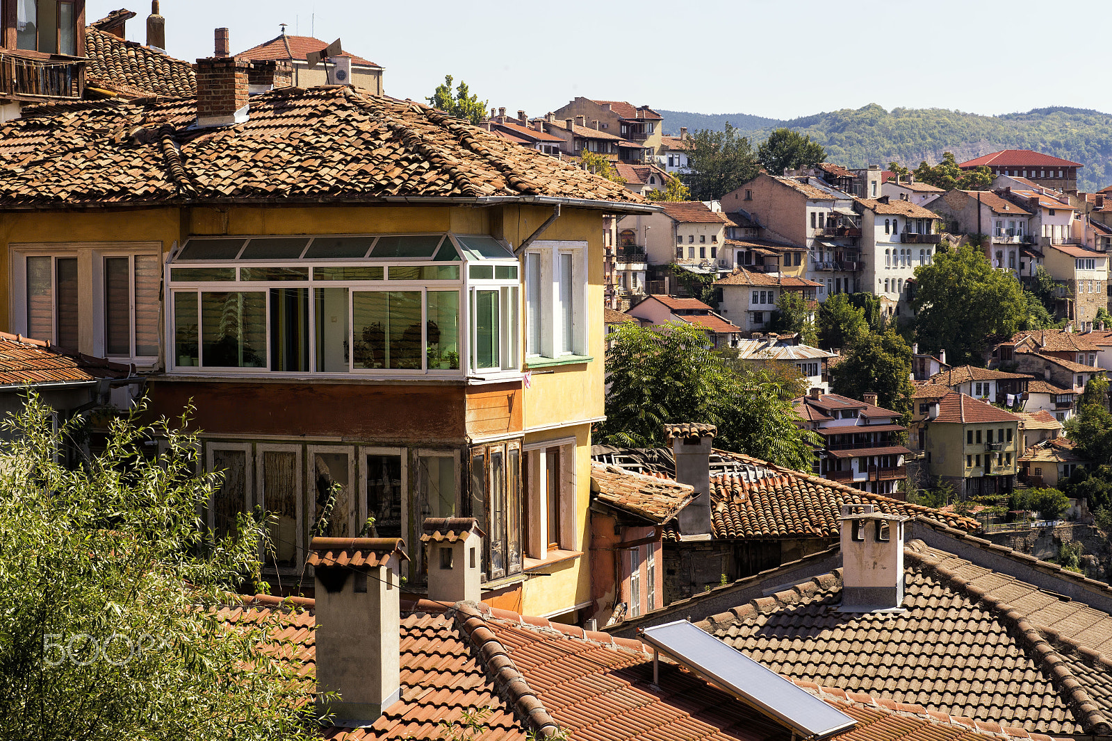 Canon EF 100mm F2.8 Macro USM sample photo. Daytime skyline of houses and buildings in veliko photography