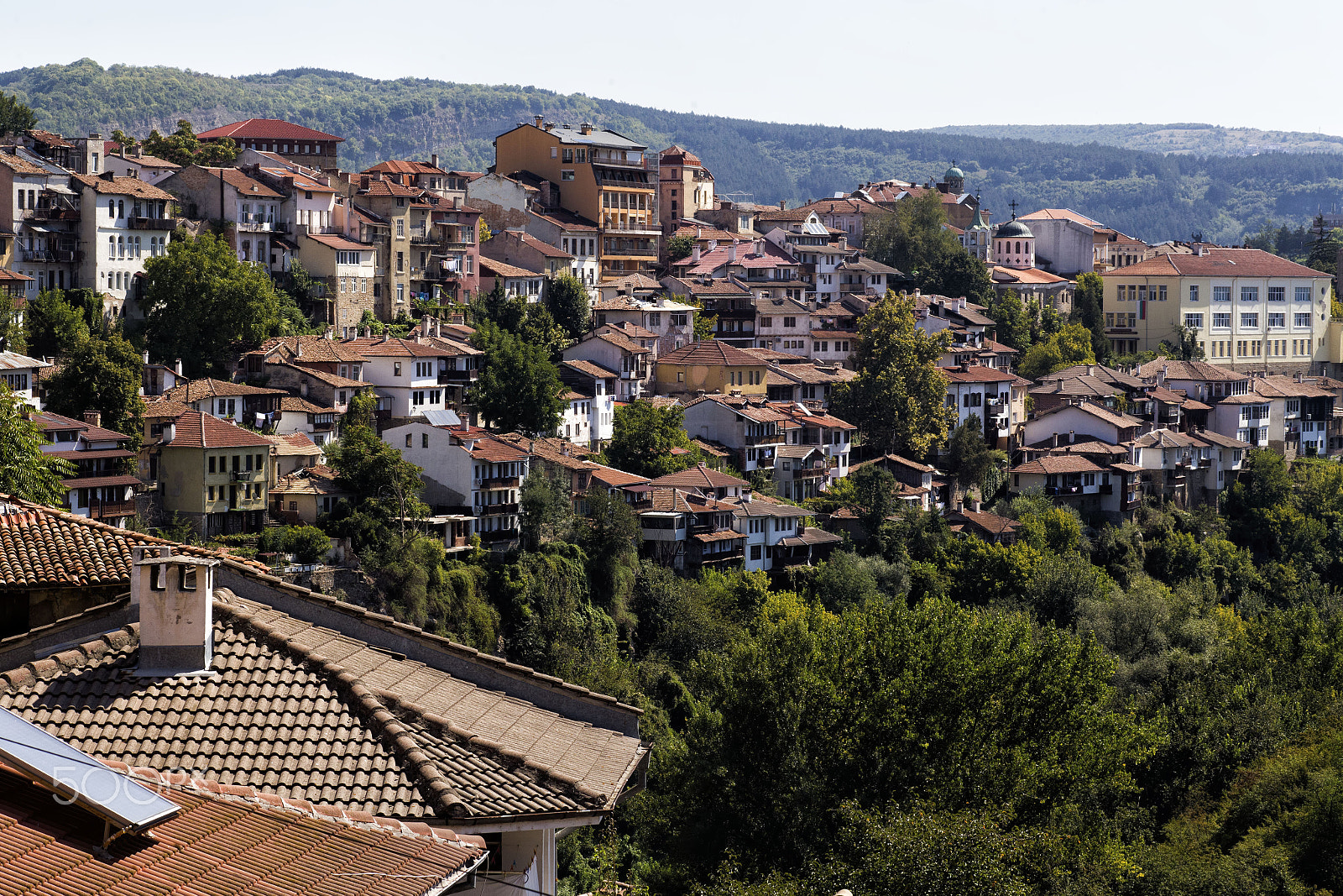 Canon EF 100mm F2.8 Macro USM sample photo. Daytime skyline of houses and buildings in veliko photography