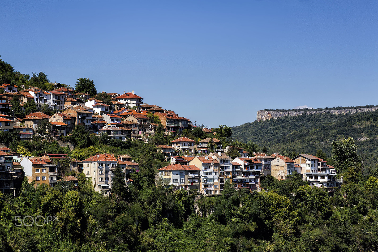 Canon EF 100mm F2.8 Macro USM sample photo. Daytime skyline of houses and buildings in veliko photography