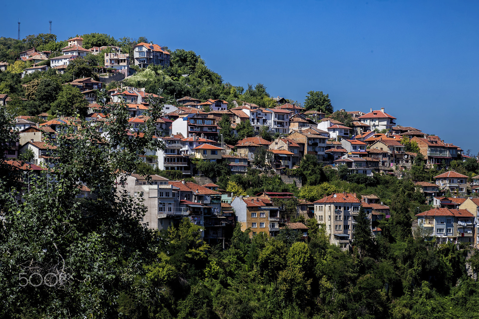 Canon EOS 6D + Canon EF 100mm F2.8 Macro USM sample photo. Daytime skyline of houses and buildings in veliko photography