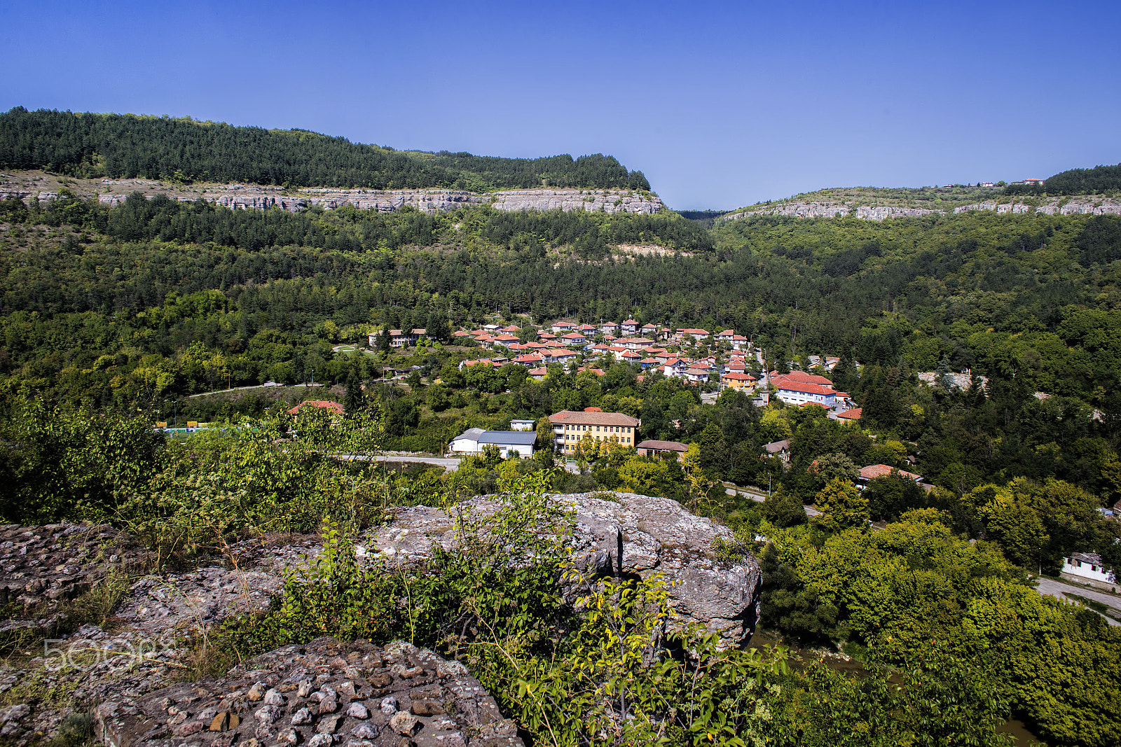 Canon EOS 6D + Canon EF 24mm F2.8 sample photo. Daytime skyline of houses and buildings in veliko photography