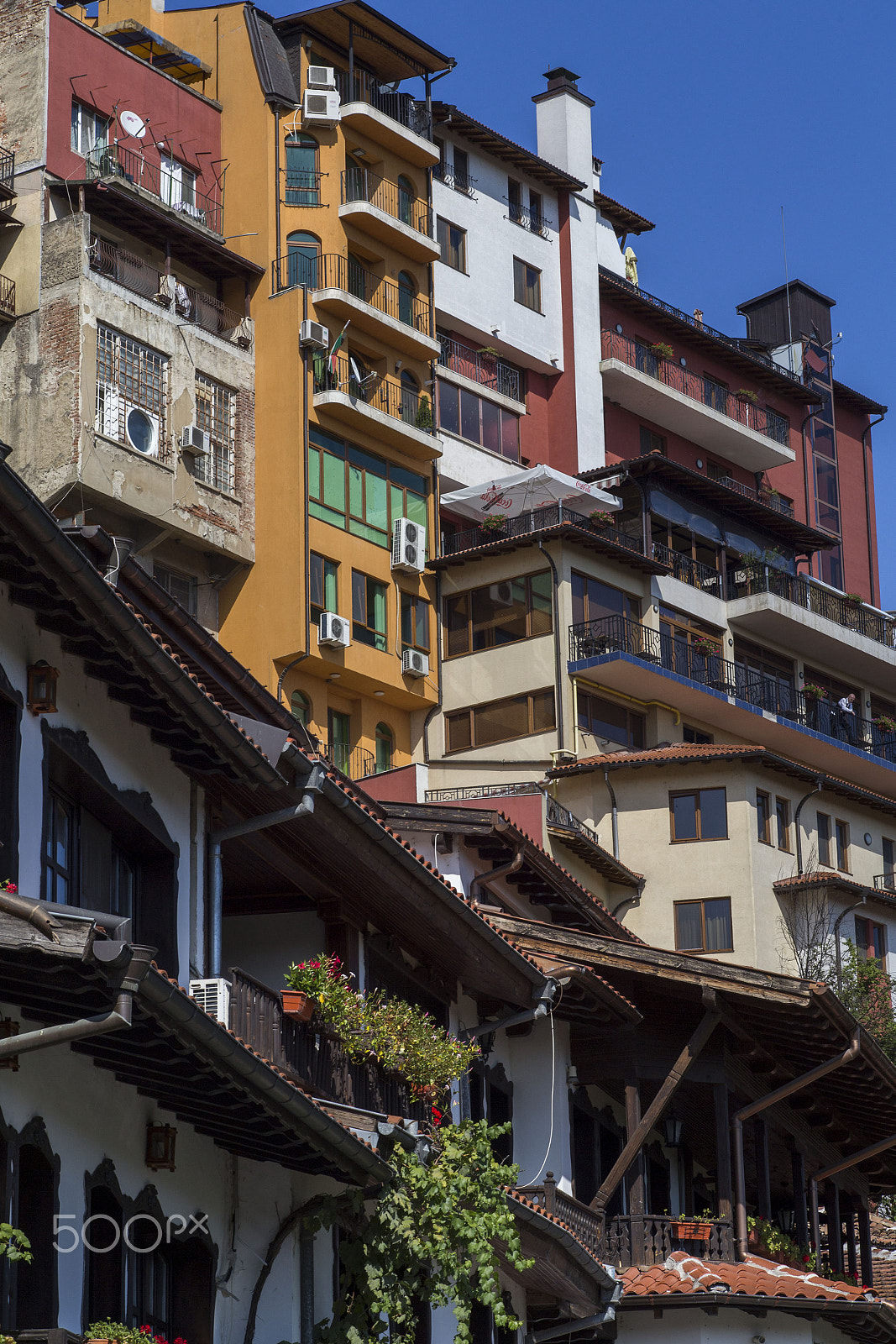 Canon EF 100mm F2.8 Macro USM sample photo. Daytime skyline of houses and buildings in veliko photography