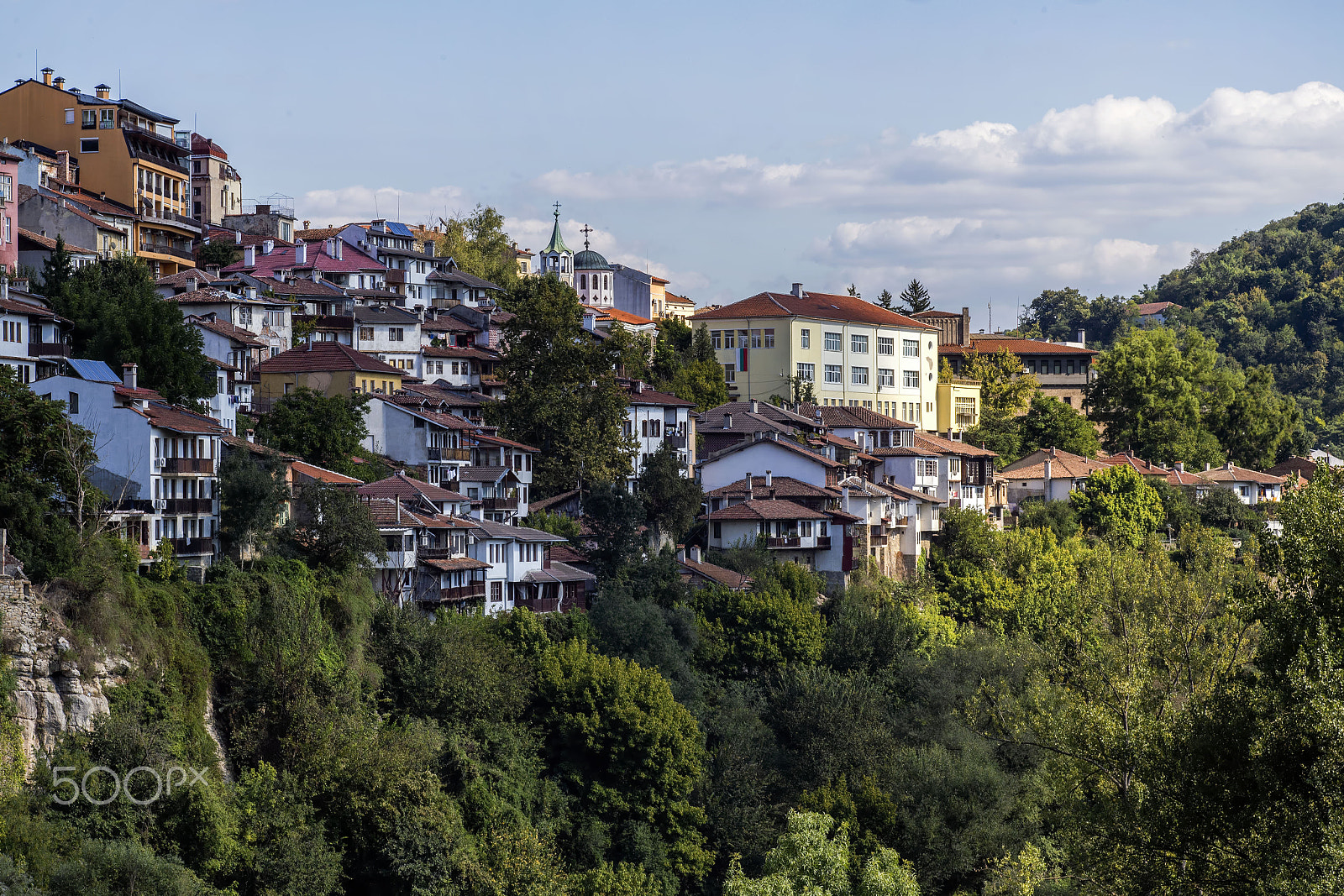 Canon EF 100mm F2.8 Macro USM sample photo. Daytime skyline of houses and buildings in veliko photography