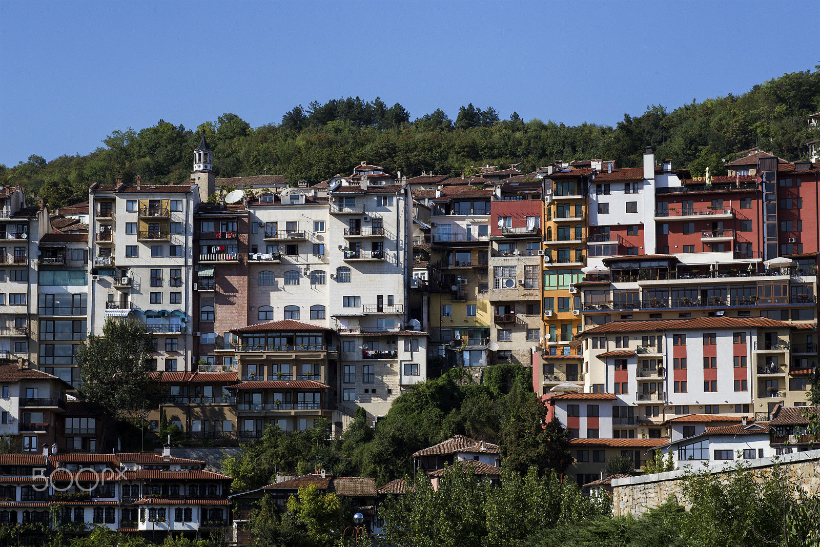 Canon EF 100mm F2.8 Macro USM sample photo. Daytime skyline of houses and buildings in veliko photography