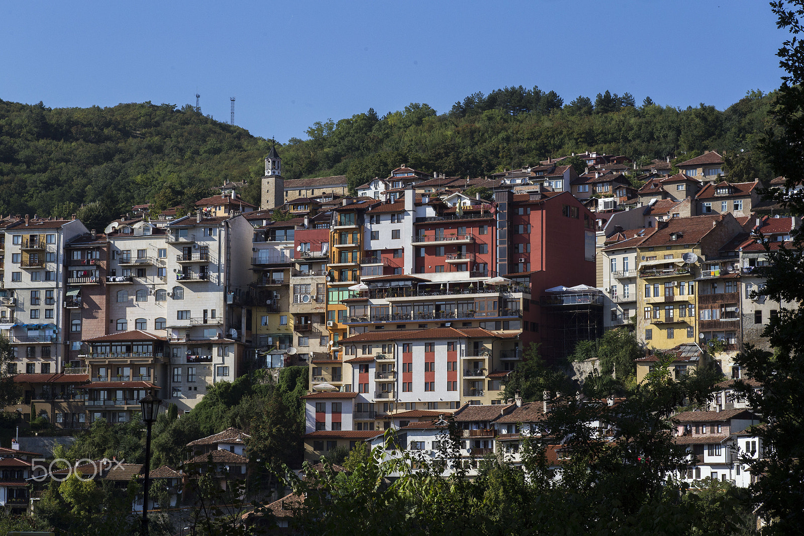 Canon EF 100mm F2.8 Macro USM sample photo. Daytime skyline of houses and buildings in veliko photography