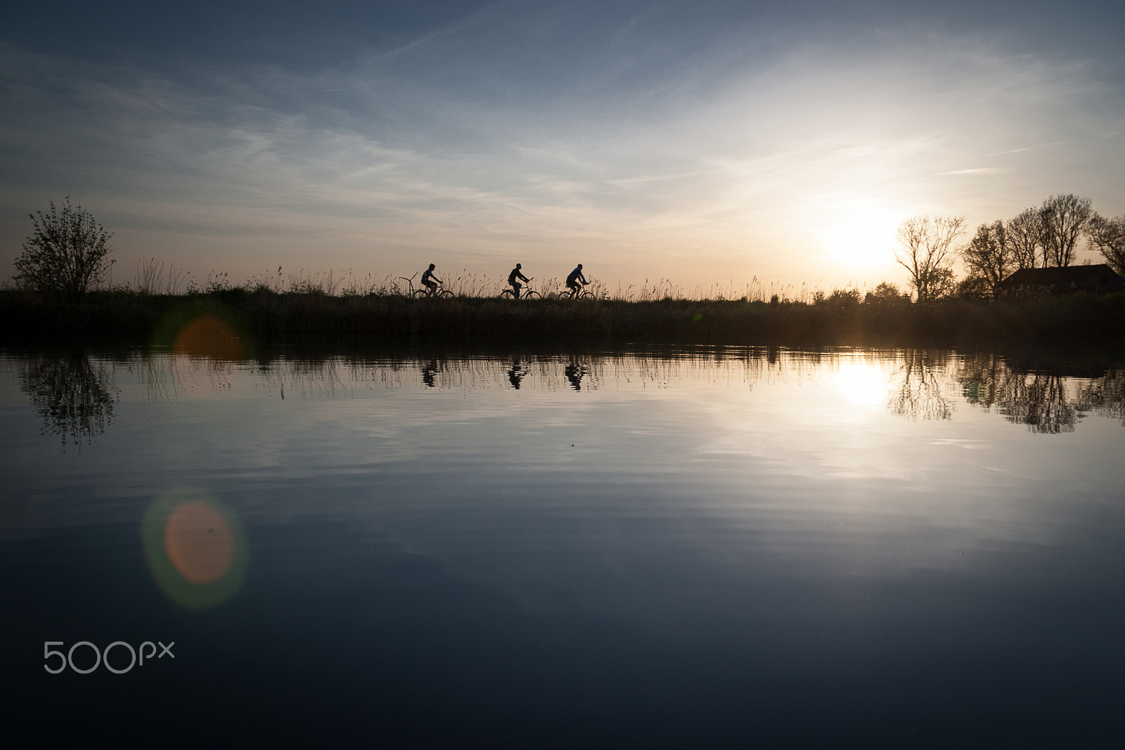 Canon EF-S 17-85mm F4-5.6 IS USM sample photo. Cycling at sundown photography