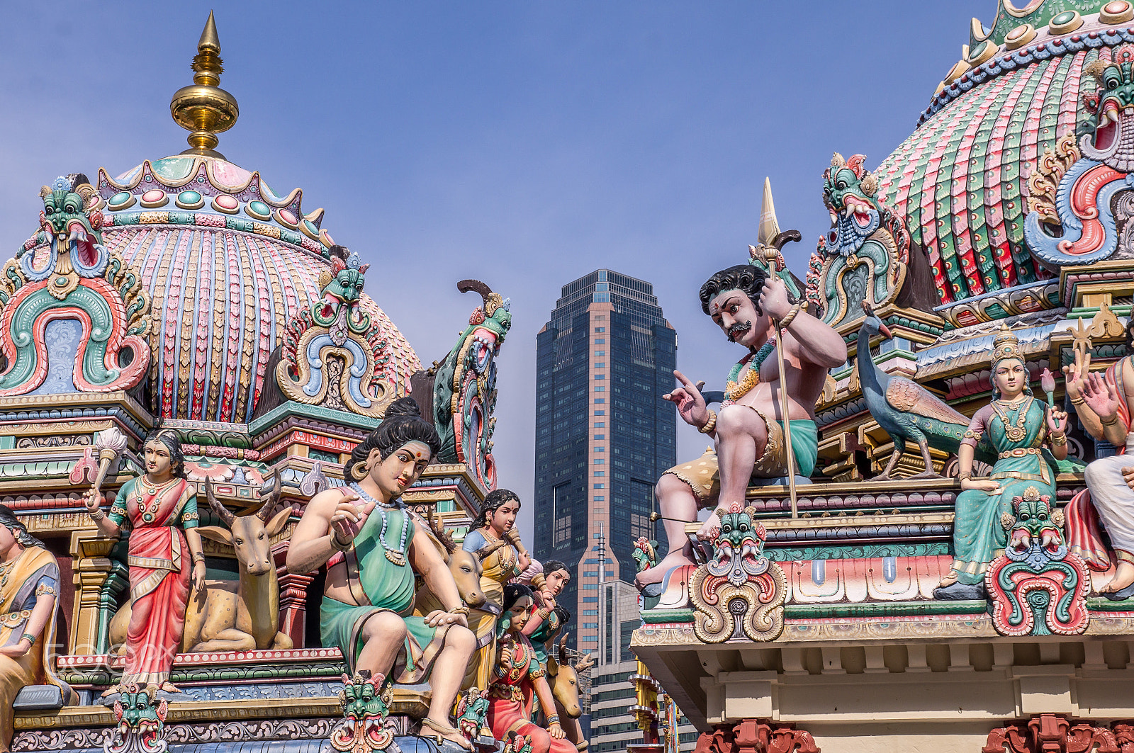 Sony SLT-A37 sample photo. Hindu temple in singapore with skyscraper photography