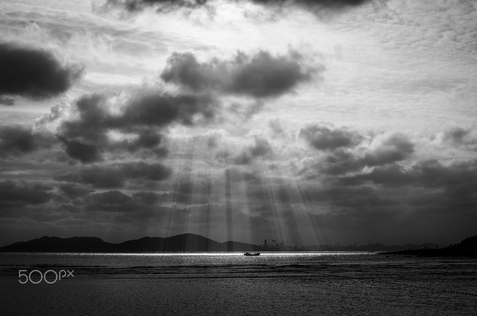 Pentax K-50 + Pentax smc DA 35mm F2.4 AL sample photo. Light through clouds photography
