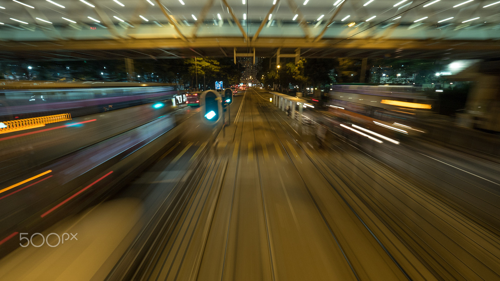 Panasonic Lumix DMC-GH4 sample photo. View from moving tram in night hong kong photography