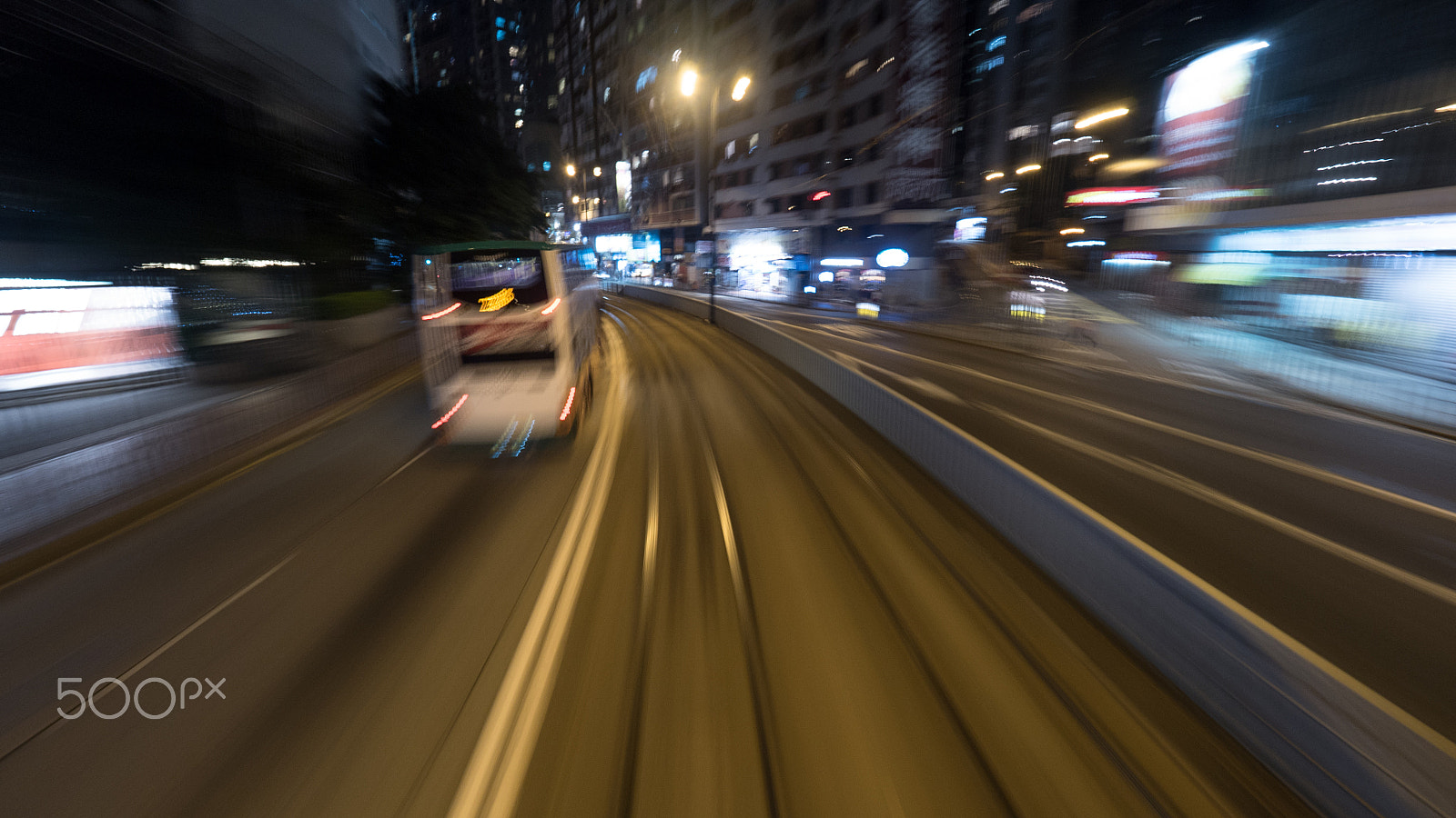 Panasonic Lumix DMC-GH4 + Olympus M.Zuiko Digital ED 7-14mm F2.8 PRO sample photo. Traveling by tram in night hong kong photography