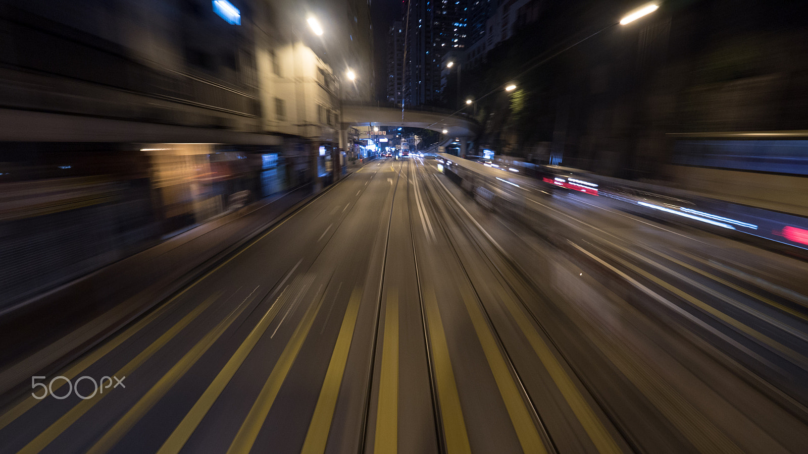 Panasonic Lumix DMC-GH4 + Olympus M.Zuiko Digital ED 7-14mm F2.8 PRO sample photo. Night tram ride in hong kong photography