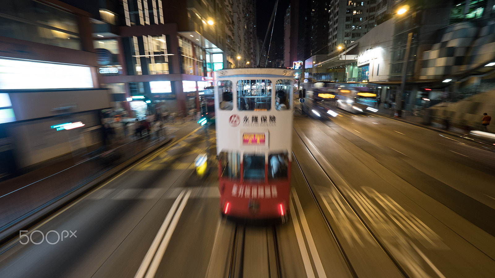 Panasonic Lumix DMC-GH4 + Olympus M.Zuiko Digital ED 7-14mm F2.8 PRO sample photo. Double-decker tram and buses in night hong kong photography