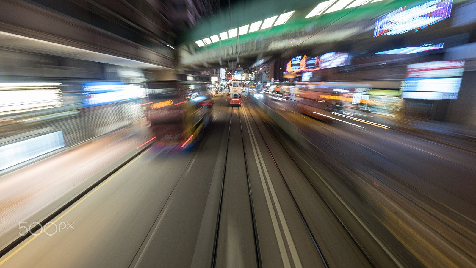 Panasonic Lumix DMC-GH4 sample photo. Traveling by tram in hong kong at night photography