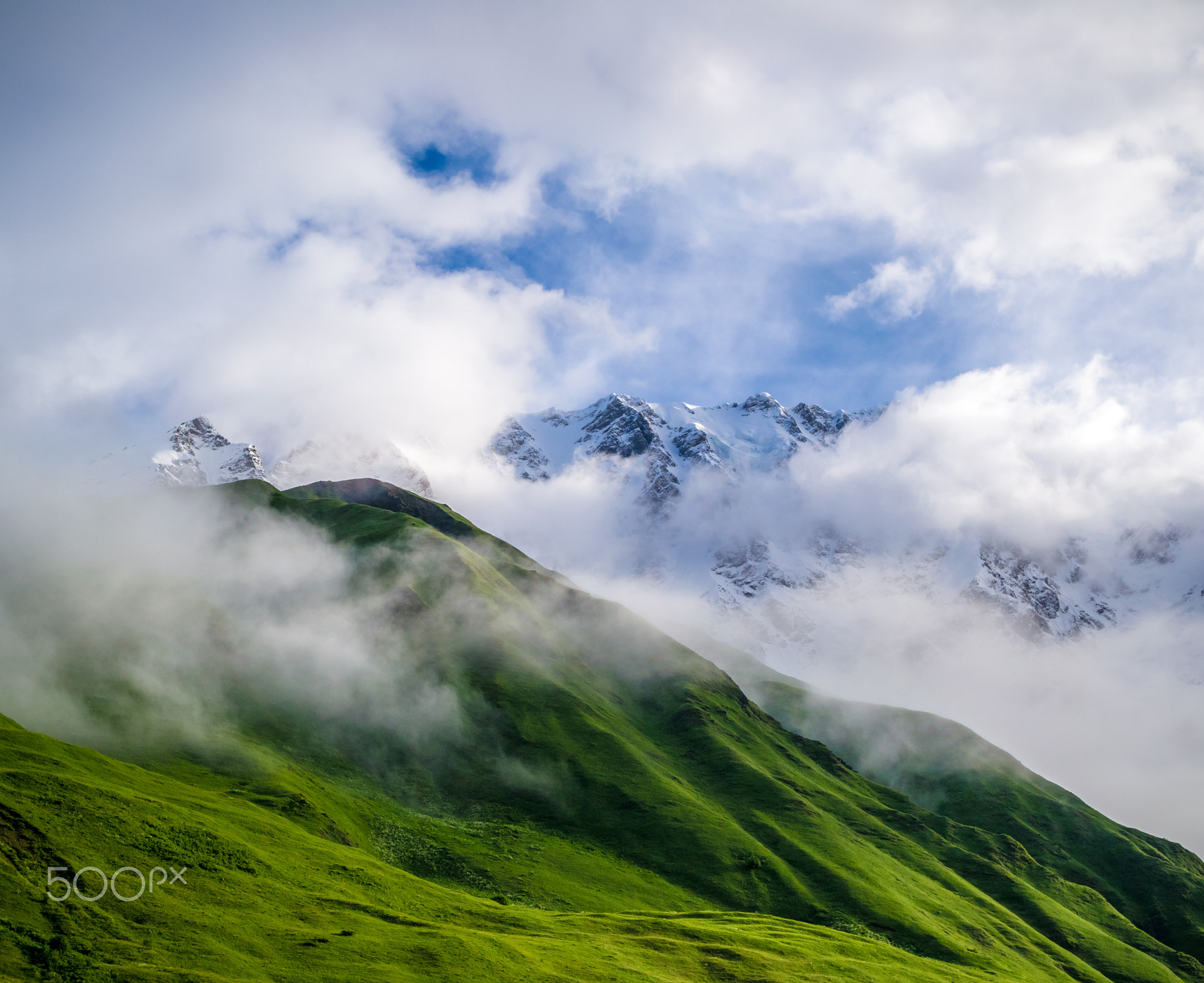 Mountain peak in a clouds