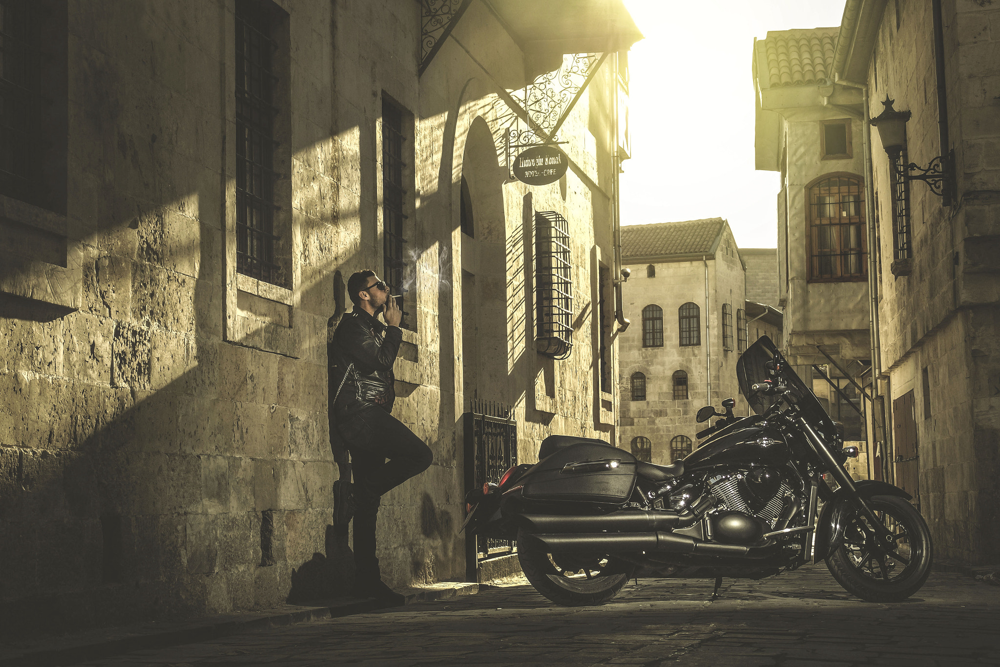 Samsung NX mini sample photo. Old city biker photography