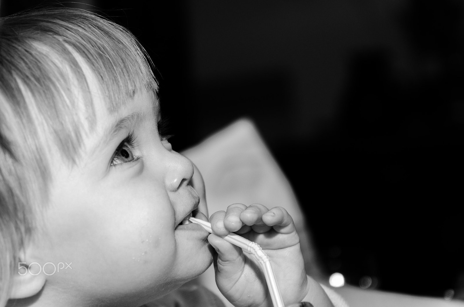 Sigma 17-70mm F2.8-4 DC Macro OS HSM sample photo. Child with drink photography
