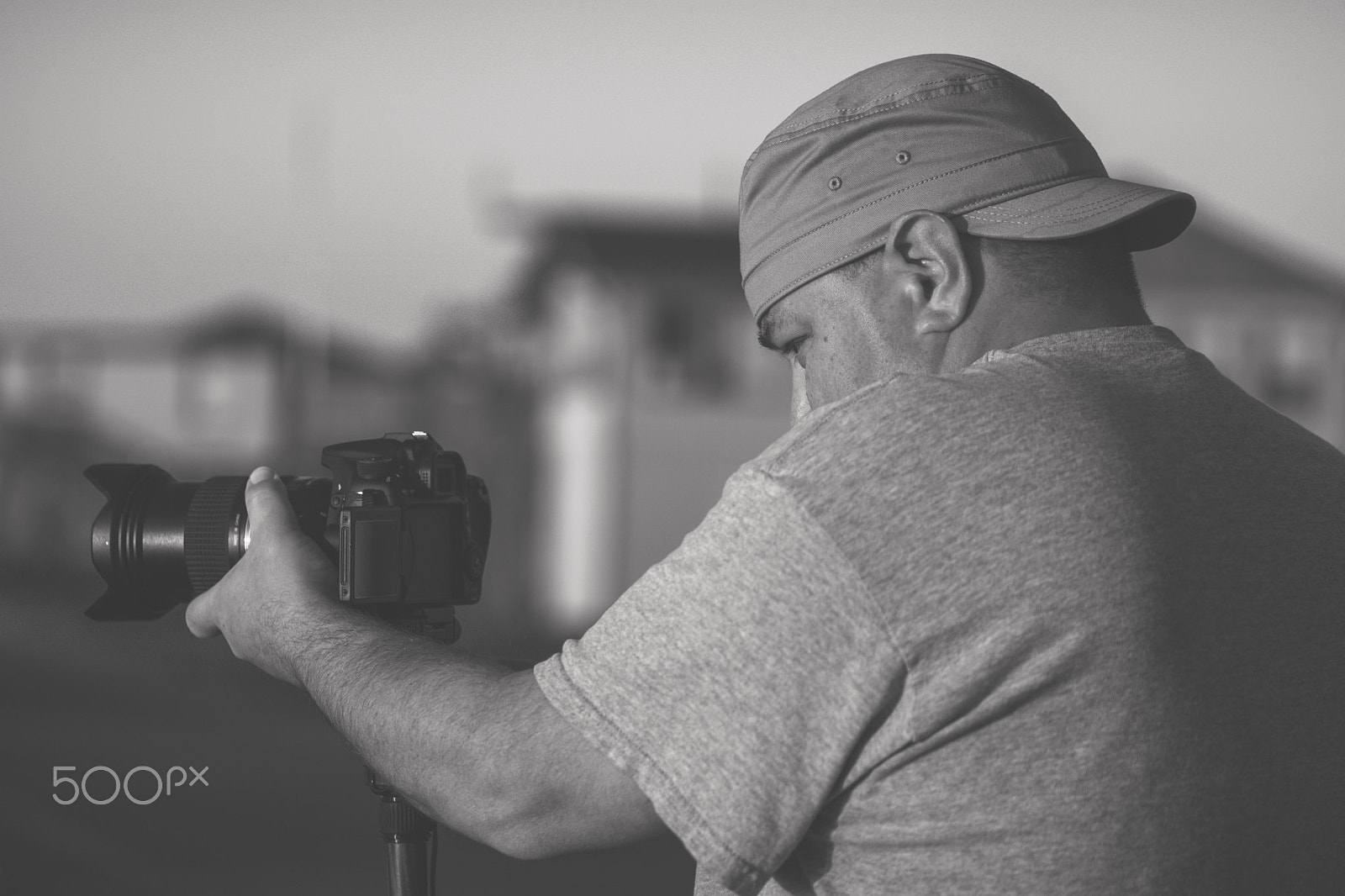 Canon EF 100mm F2.8L Macro IS USM sample photo. Photographer in action black and white photography