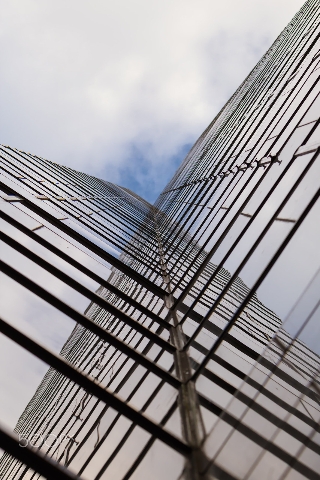 Canon EF 100mm F2.8L Macro IS USM sample photo. Downtown houston building mirrored photography