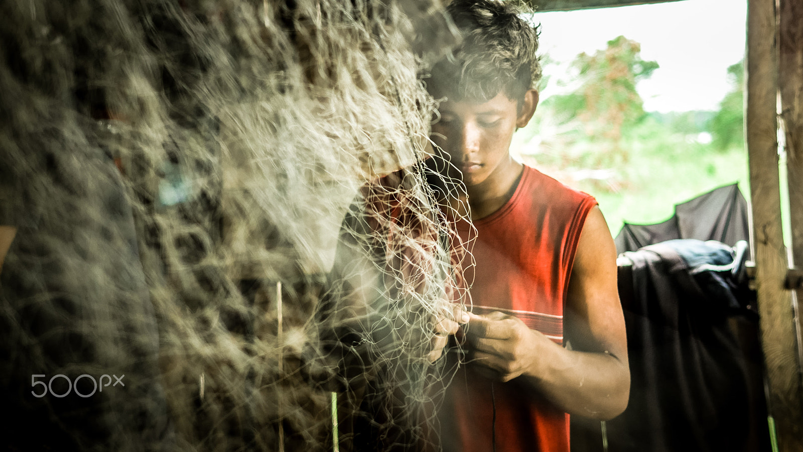 Panasonic Lumix DMC-GH4 sample photo. Young fisherman photography