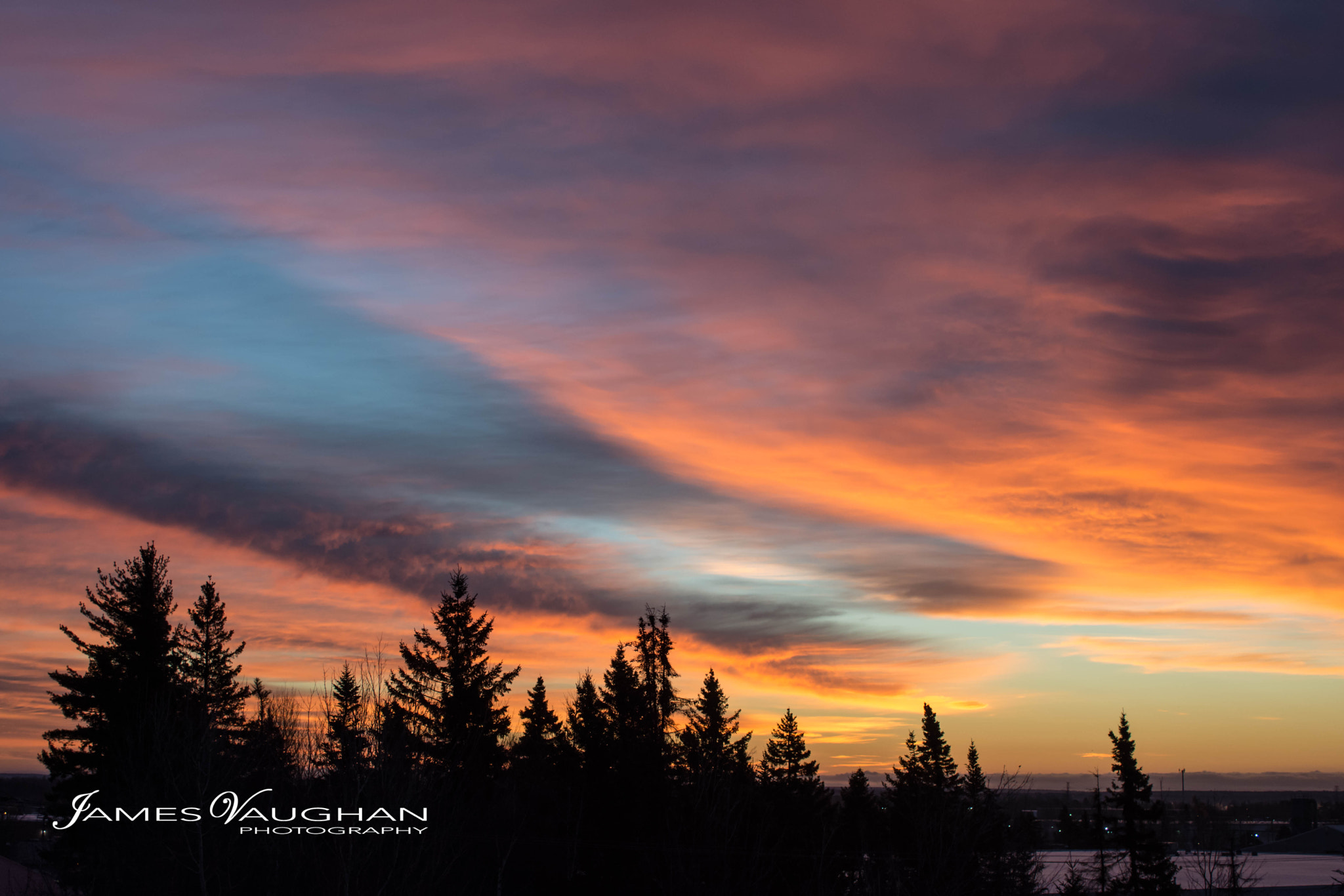 Nikon D7200 + AF Zoom-Nikkor 35-70mm f/2.8D sample photo. Distant object casts a shadow over moncton photography