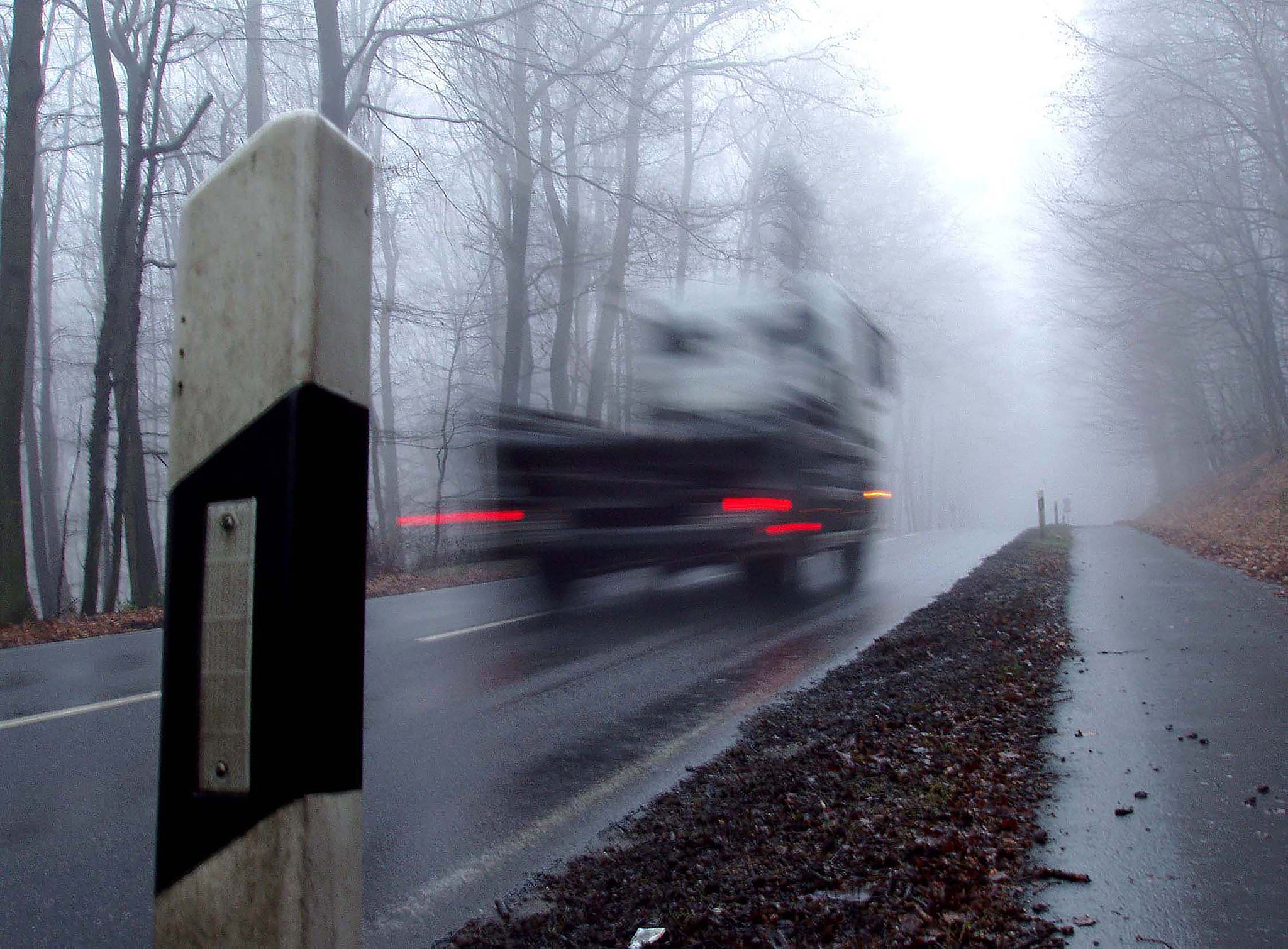 Olympus X-2,C-50Z sample photo. Vehicle with "speed light" on the road photography
