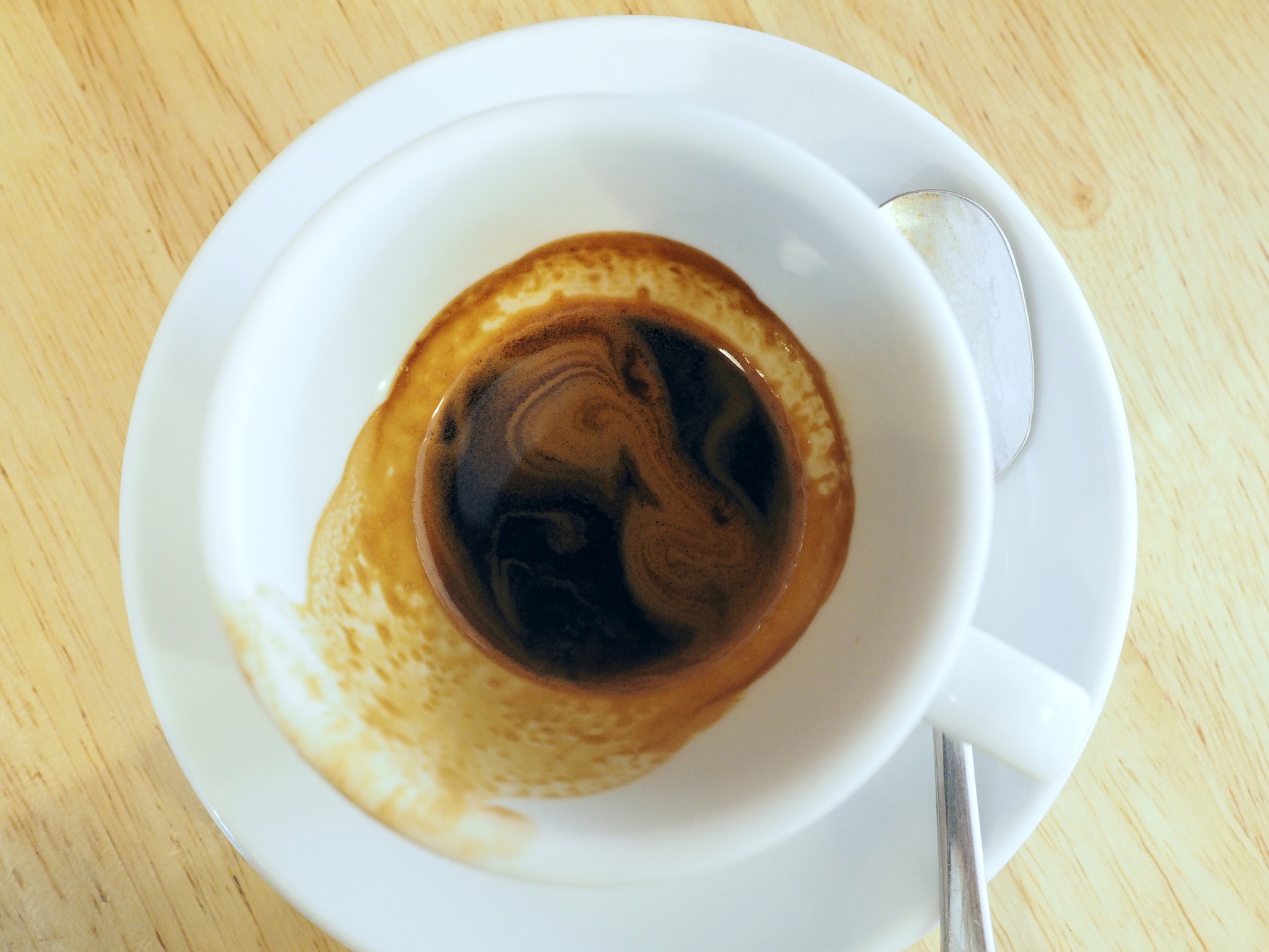 Olympus M.Zuiko Digital ED 12-40mm F2.8 Pro sample photo. One simple espresso in big cup photography