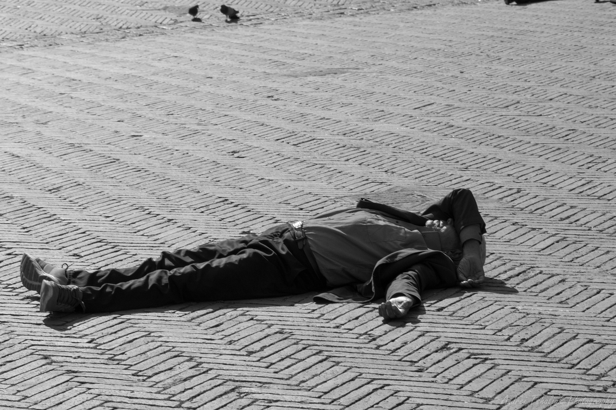 Sigma 85mm F1.4 EX DG HSM sample photo. A man sleeping photography