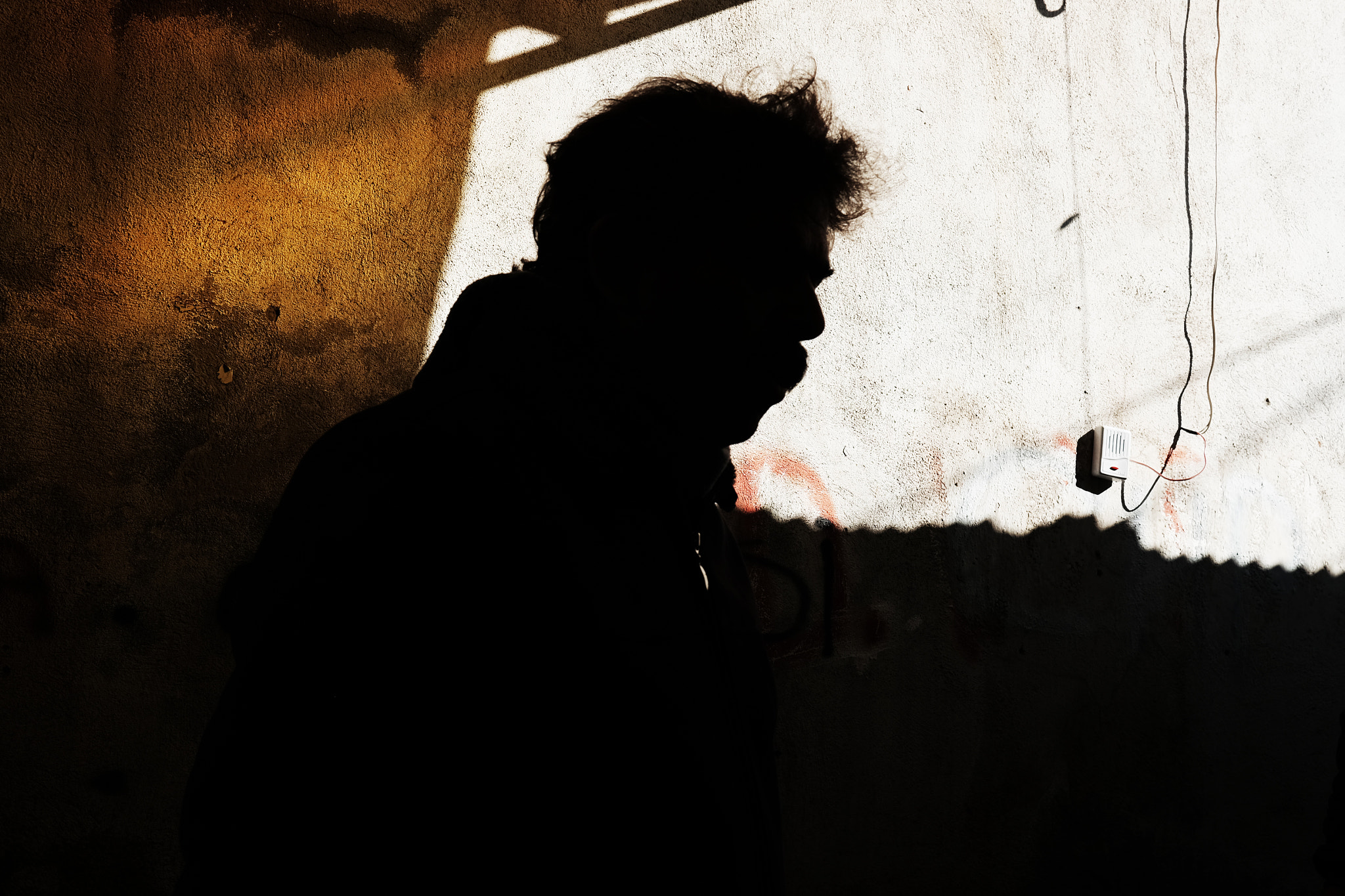 Fujifilm X-T10 + Fujifilm XF 23mm F2 R WR sample photo. Man in the dark photography