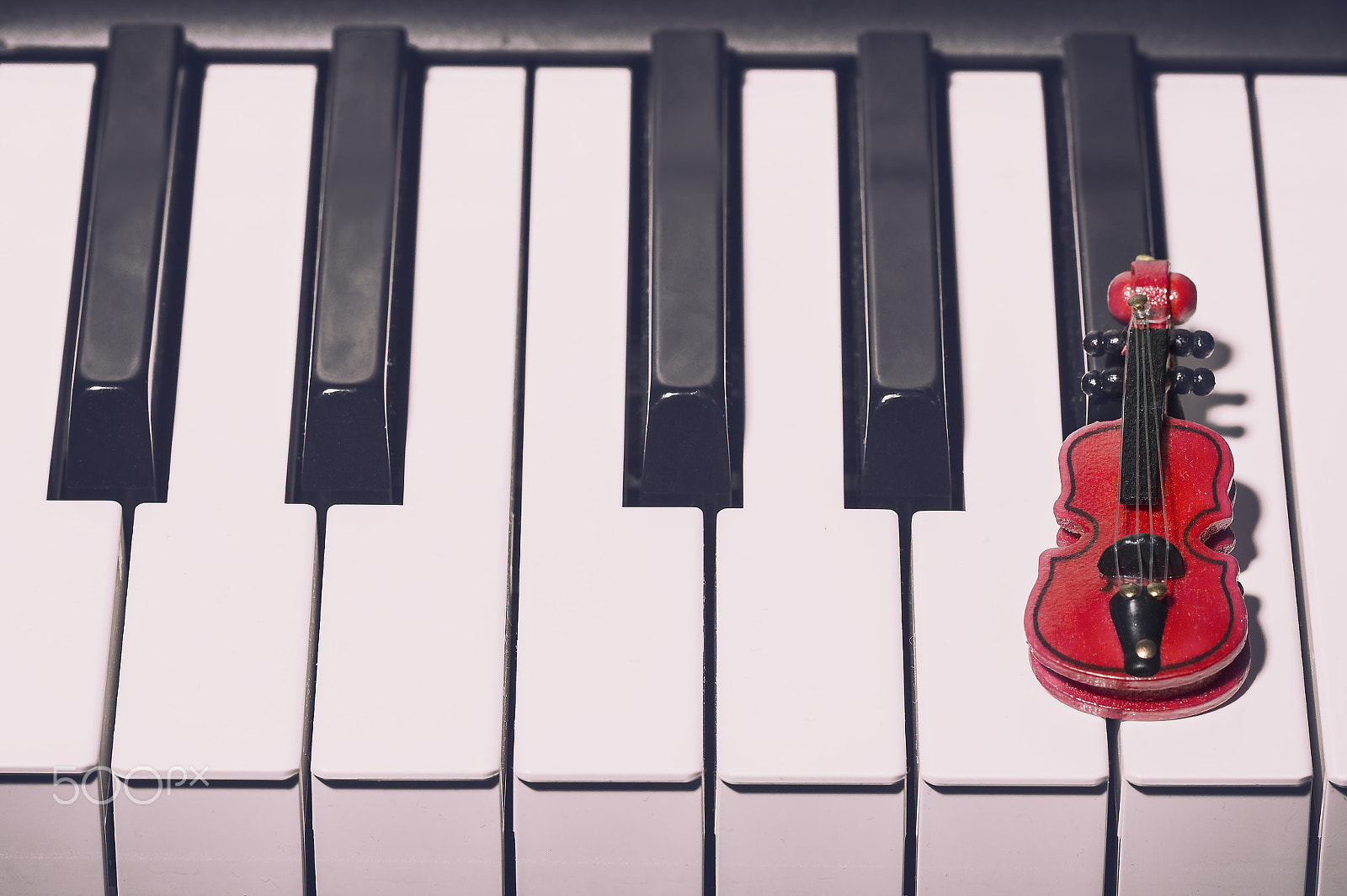 Canon EF 100mm F2.8L Macro IS USM sample photo. Music concept. red decorative violin on the piano photography