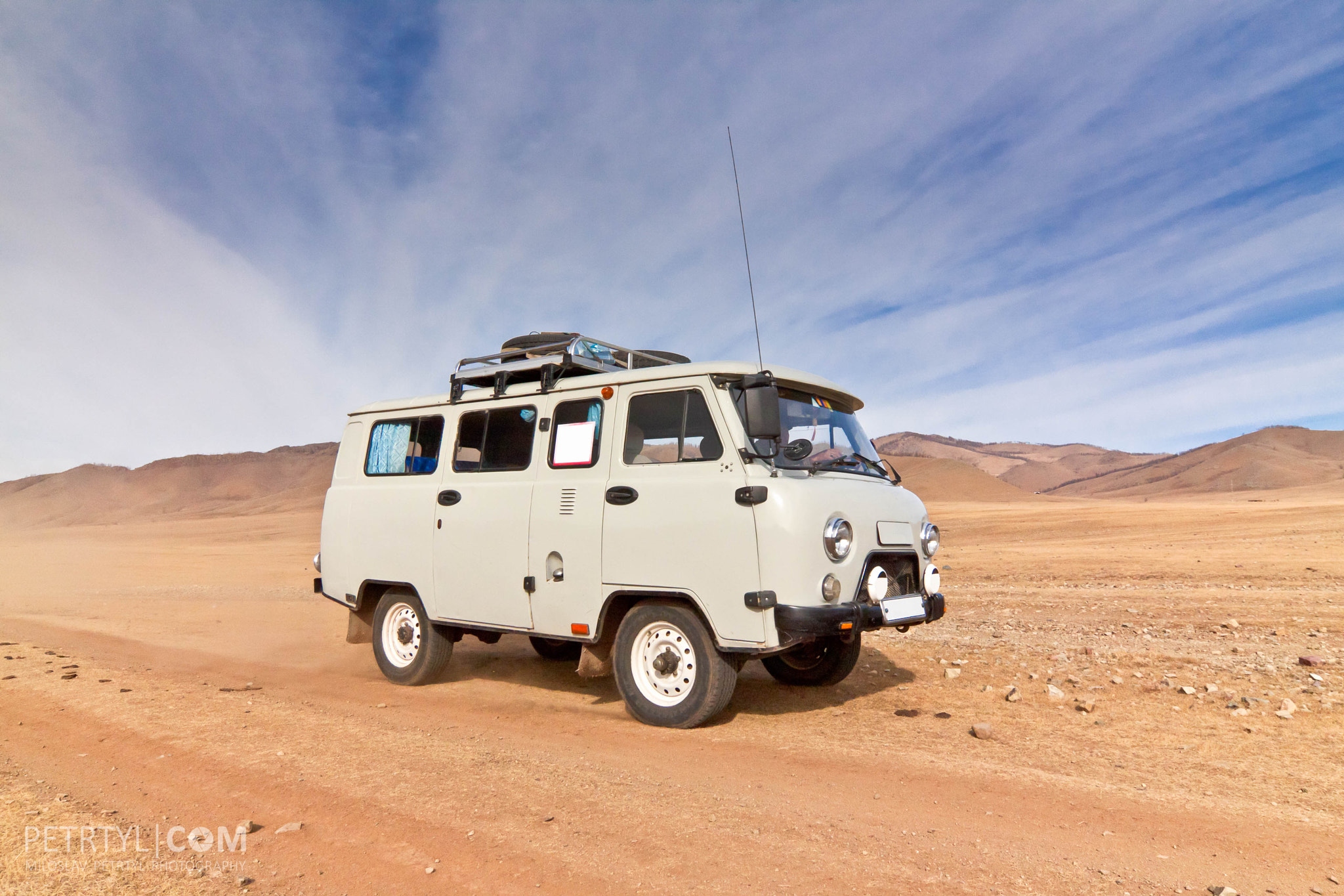 Tokina AT-X Pro 12-24mm F4 (IF) DX sample photo. Offroad car on the road in mongolian steppe photography