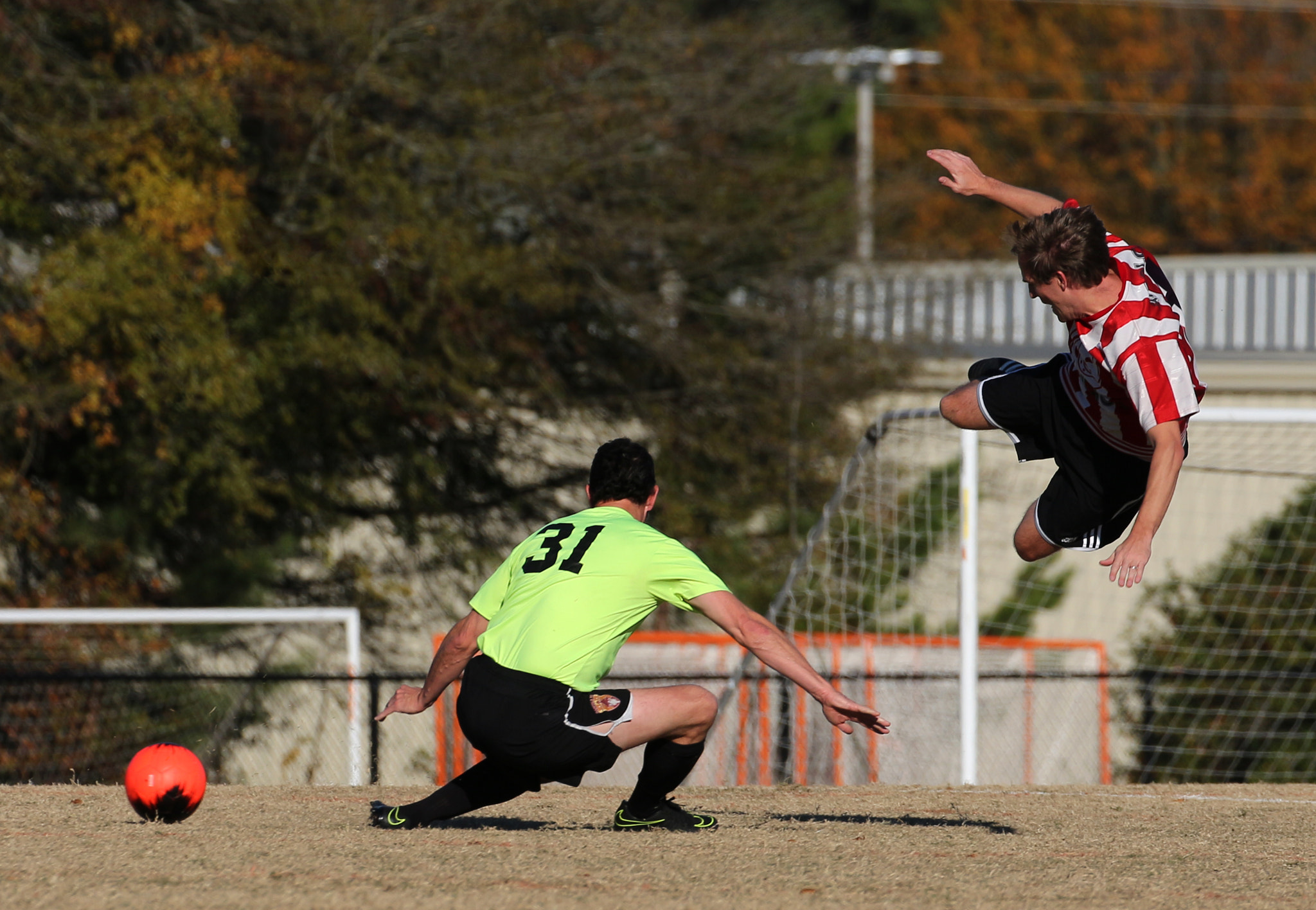 Canon EOS 700D (EOS Rebel T5i / EOS Kiss X7i) sample photo. Slide tackle photography