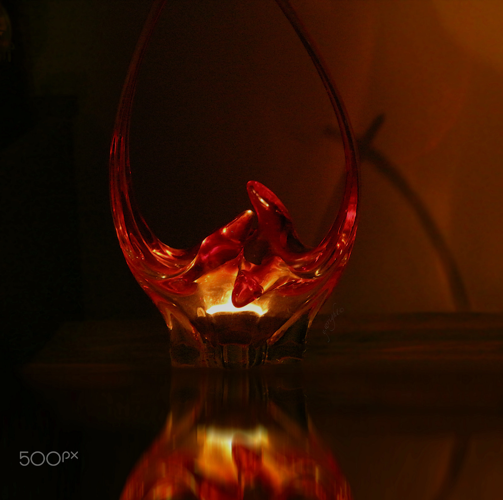 Canon EF-S 18-200mm F3.5-5.6 IS sample photo. Red glass dish with glowing candle 2 photography