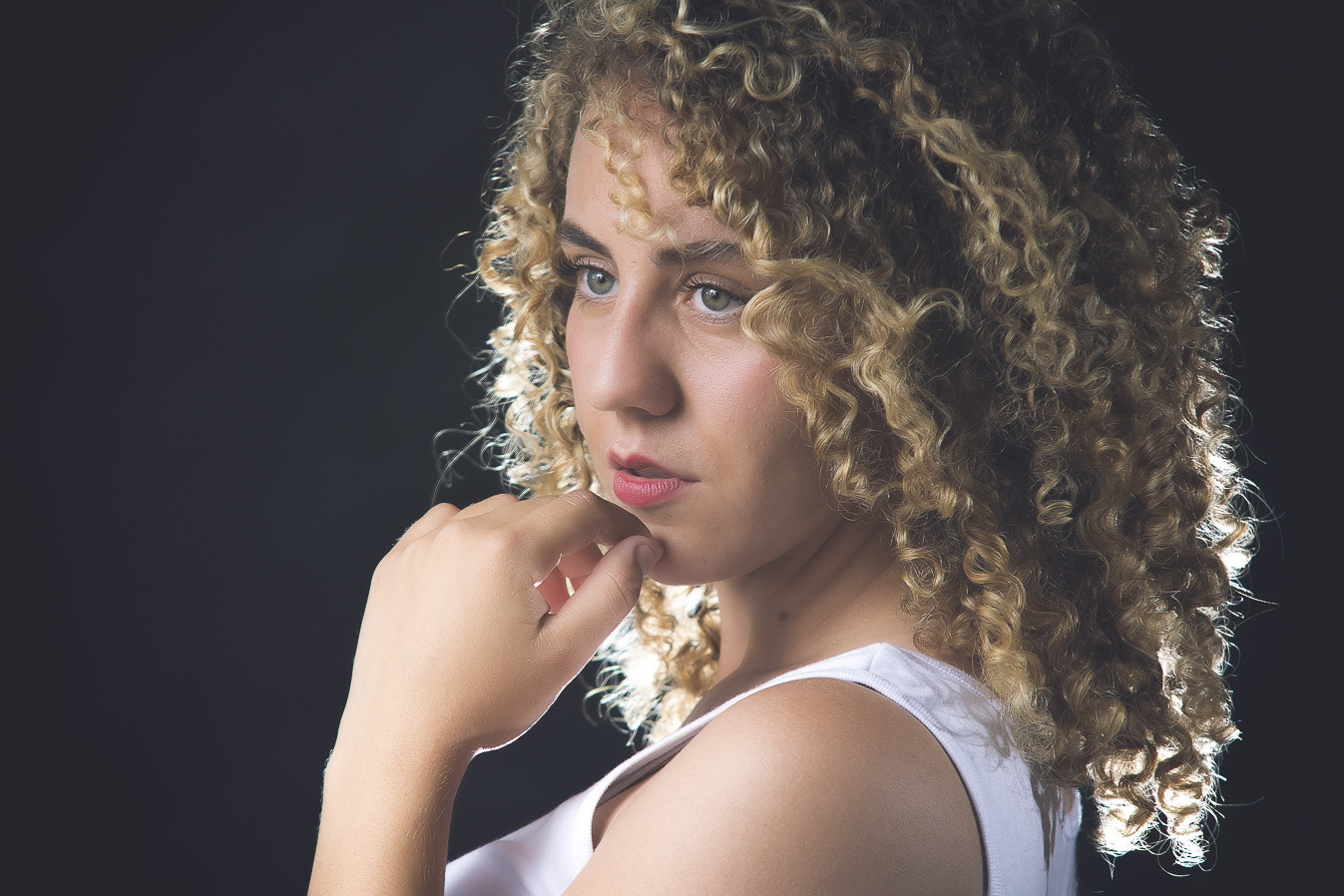 Sigma 70-200mm F2.8 EX DG Macro HSM II sample photo. Blonde girl with curly hair thinking photography