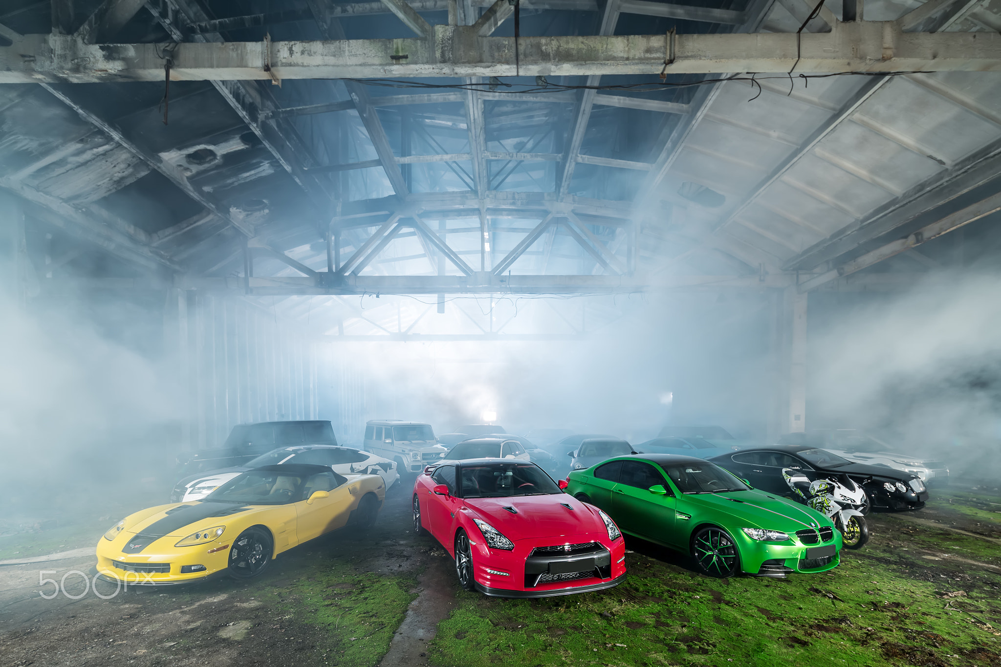 Many tuning sport-cars in hangar
