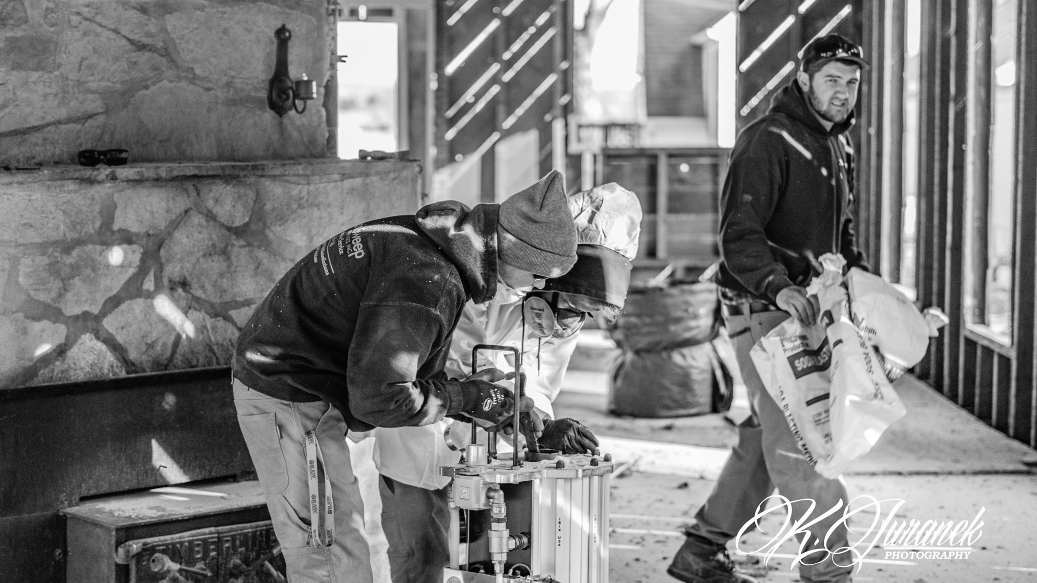 Sony FE 50mm F1.8 sample photo. Crew soda blasting photography