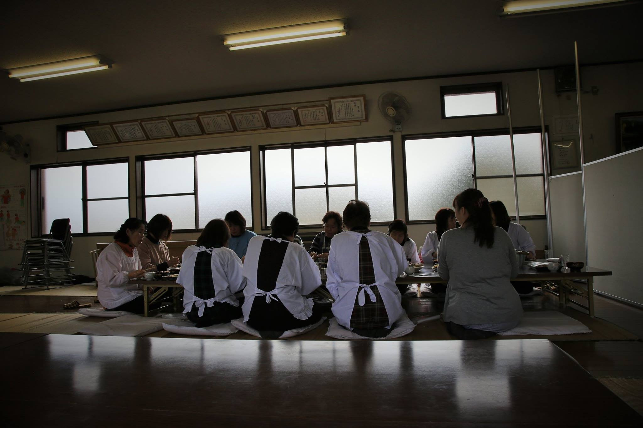 People who support a festival in the back.