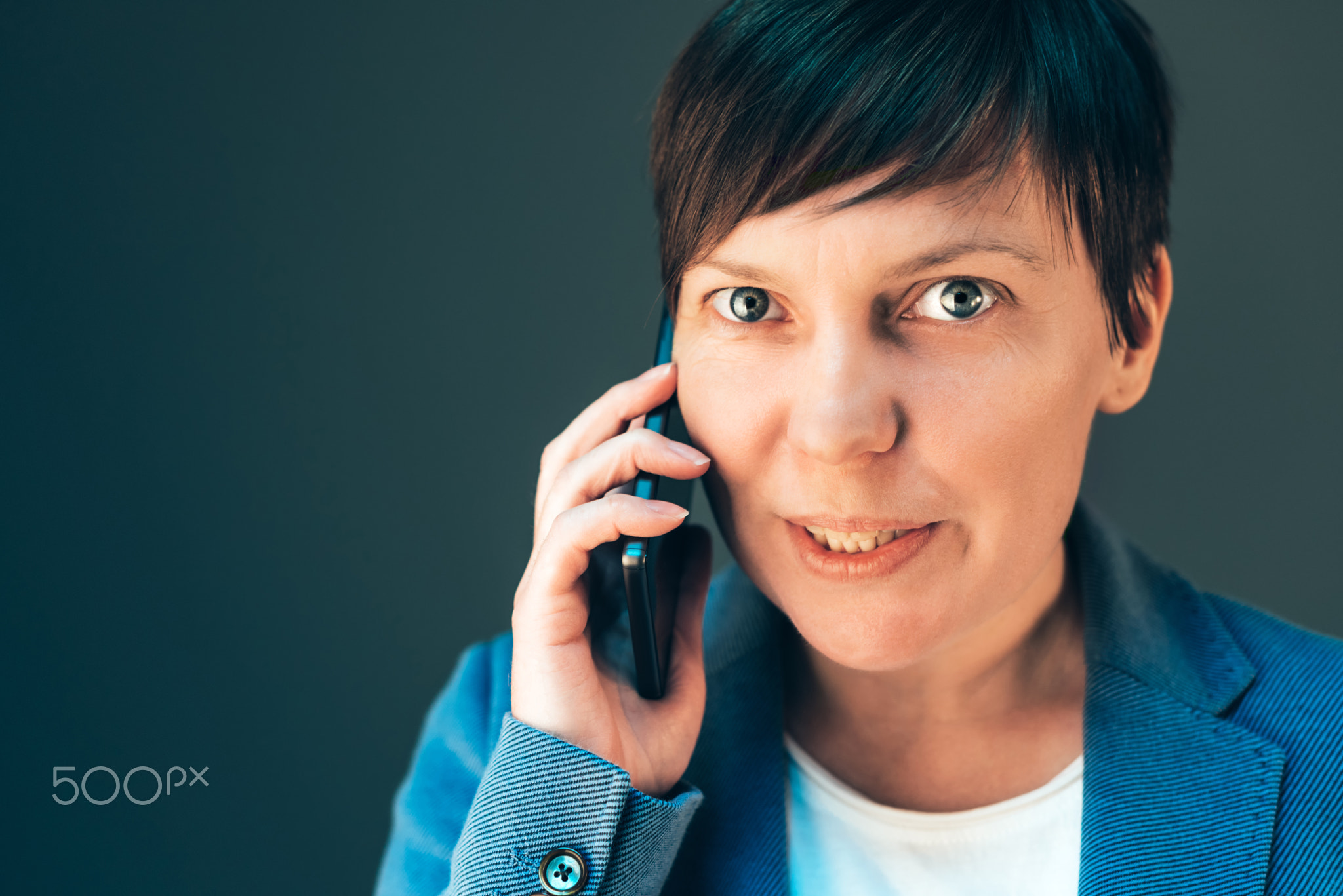 Beautiful businesswoman talking on smartphone