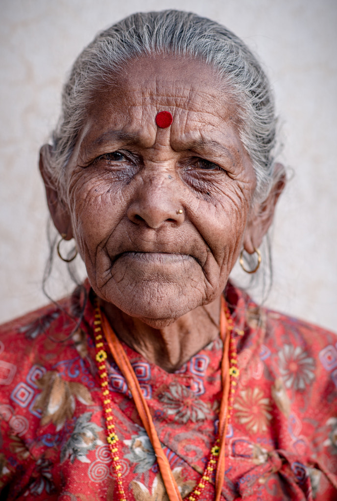 Old Nepali woman wearing traditional costume by Arsenii Gerasymenko / 500px