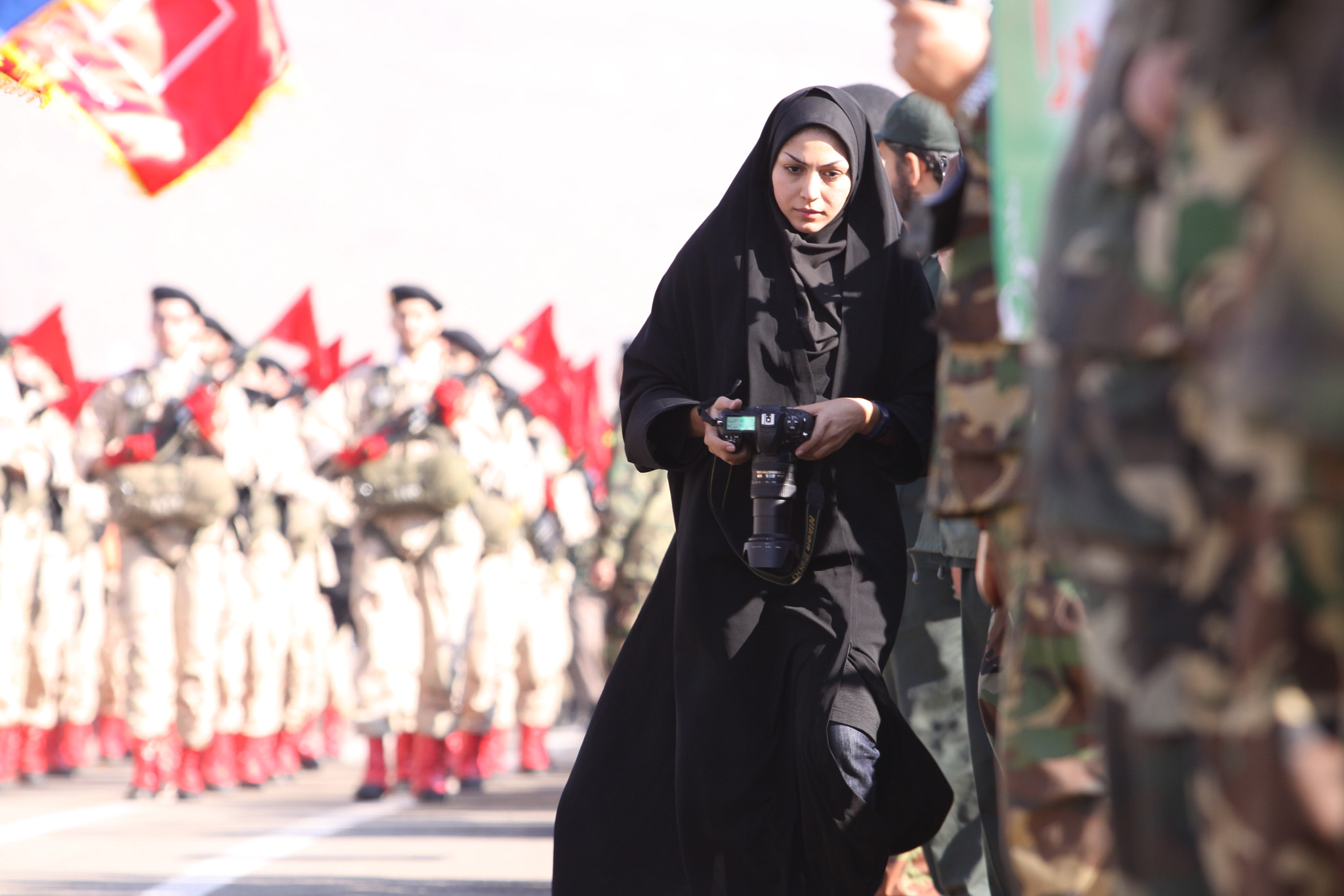 Canon EOS 50D + Canon EF 70-200mm F2.8L USM sample photo. Iranian photographer with hijab during parade photography