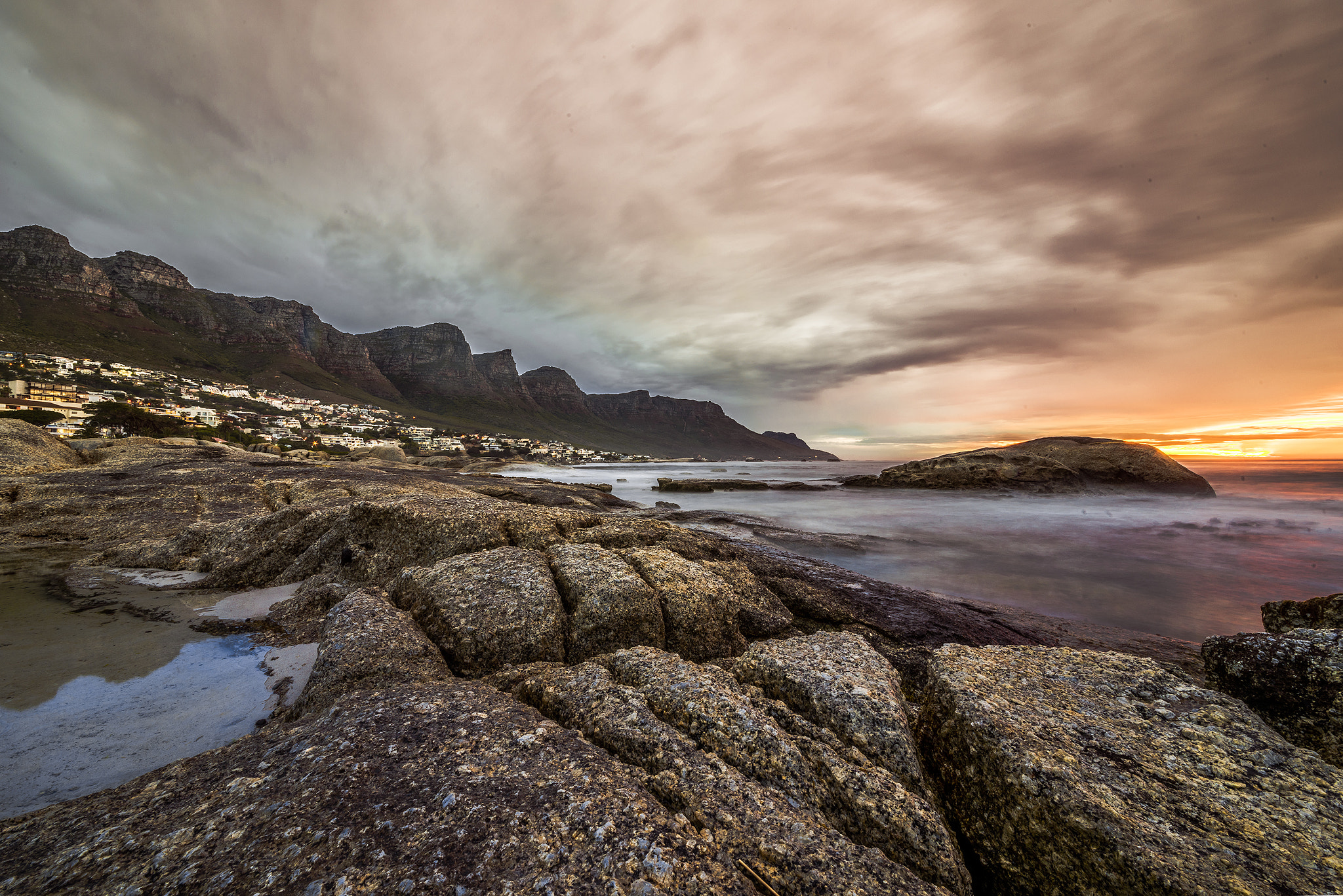 Nikon D810 + Sigma 12-24mm F4.5-5.6 II DG HSM sample photo. Cloud and rocks photography