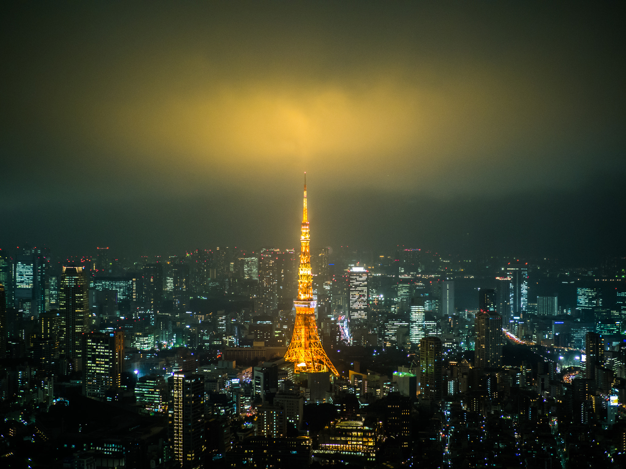 OLYMPUS M.25mm F1.2 sample photo. Tokyo tower and illuminated clouds photography