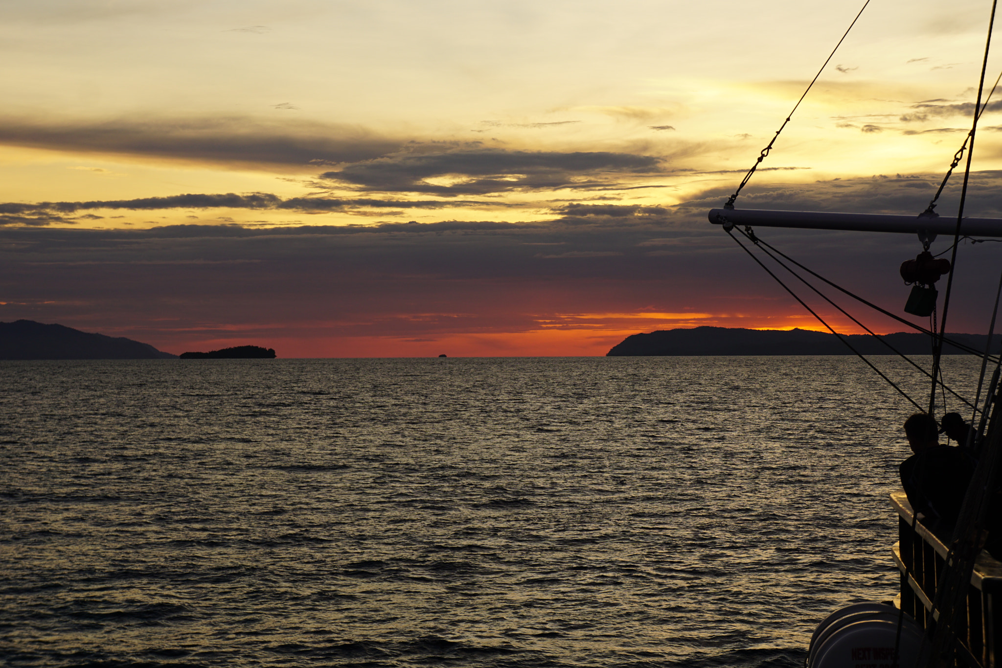 Sony E 18-55mm F3.5-5.6 OSS sample photo. Indonesian sunset from the water photography