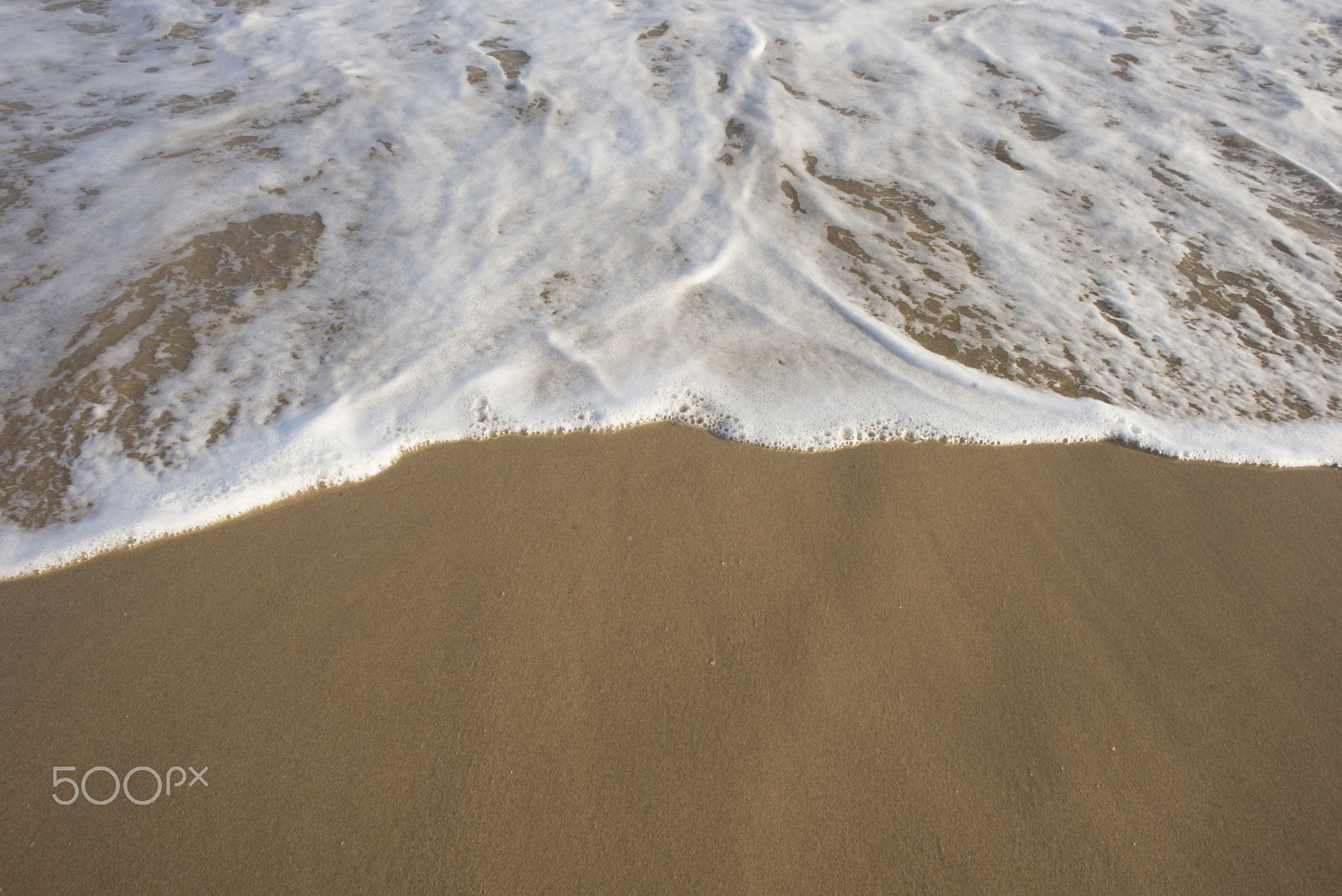 Nikon D600 + Nikon AF Nikkor 24mm F2.8D sample photo. Sea water and foam on beach photography