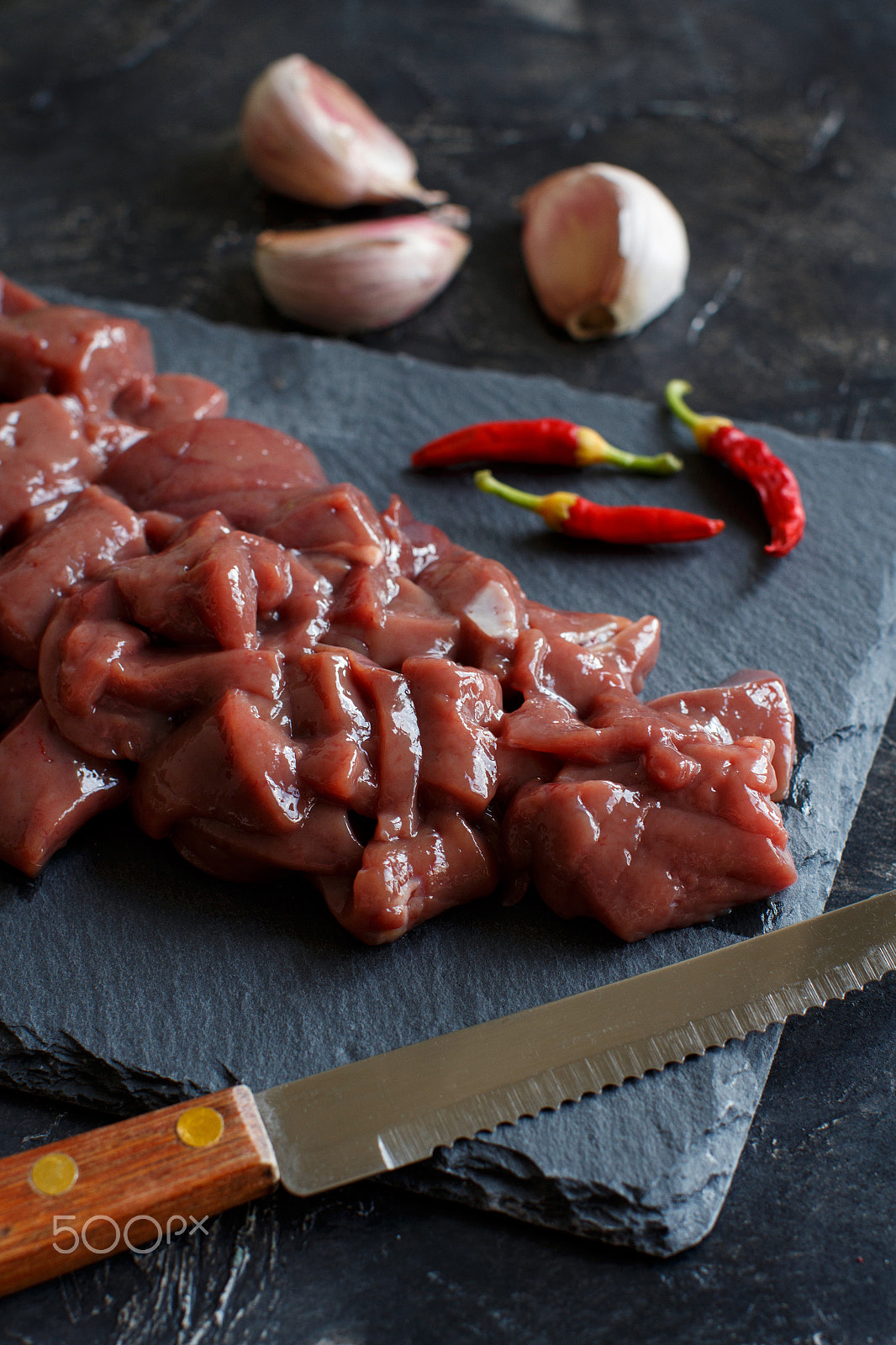Canon EOS 650D (EOS Rebel T4i / EOS Kiss X6i) + Canon EF 50mm F1.2L USM sample photo. Raw beef liver photography