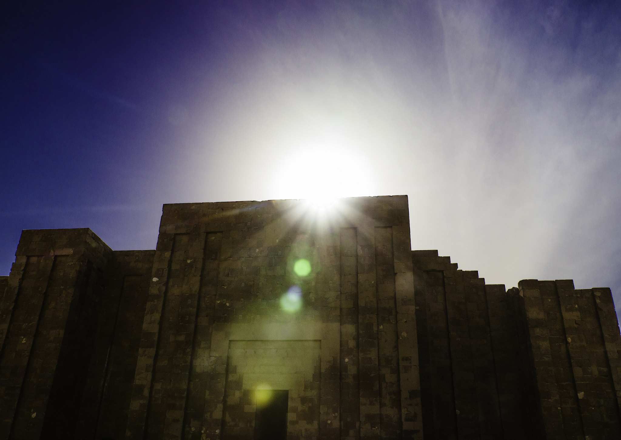 Panasonic Lumix DMC-GH2 sample photo. Sun flairs at the temple photography