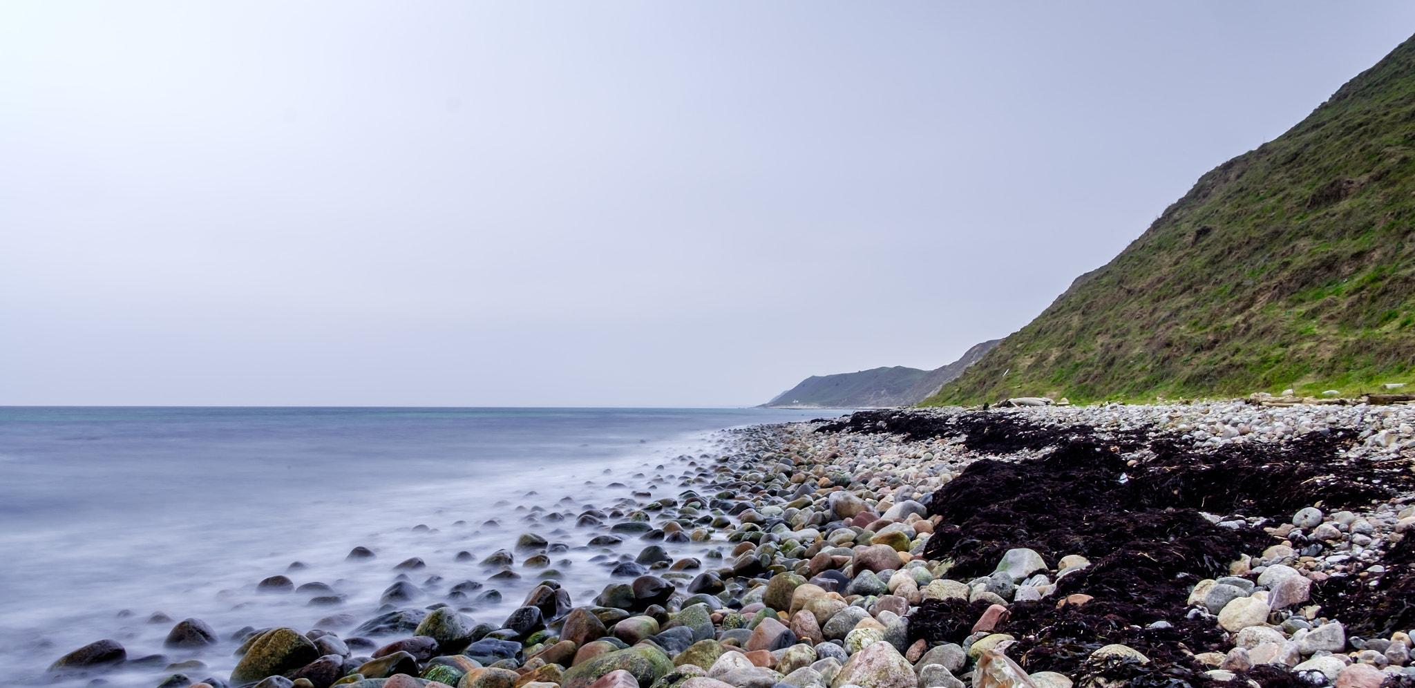 Fujifilm X-T10 + Fujifilm XF 18mm F2 R sample photo. Stony beach photography